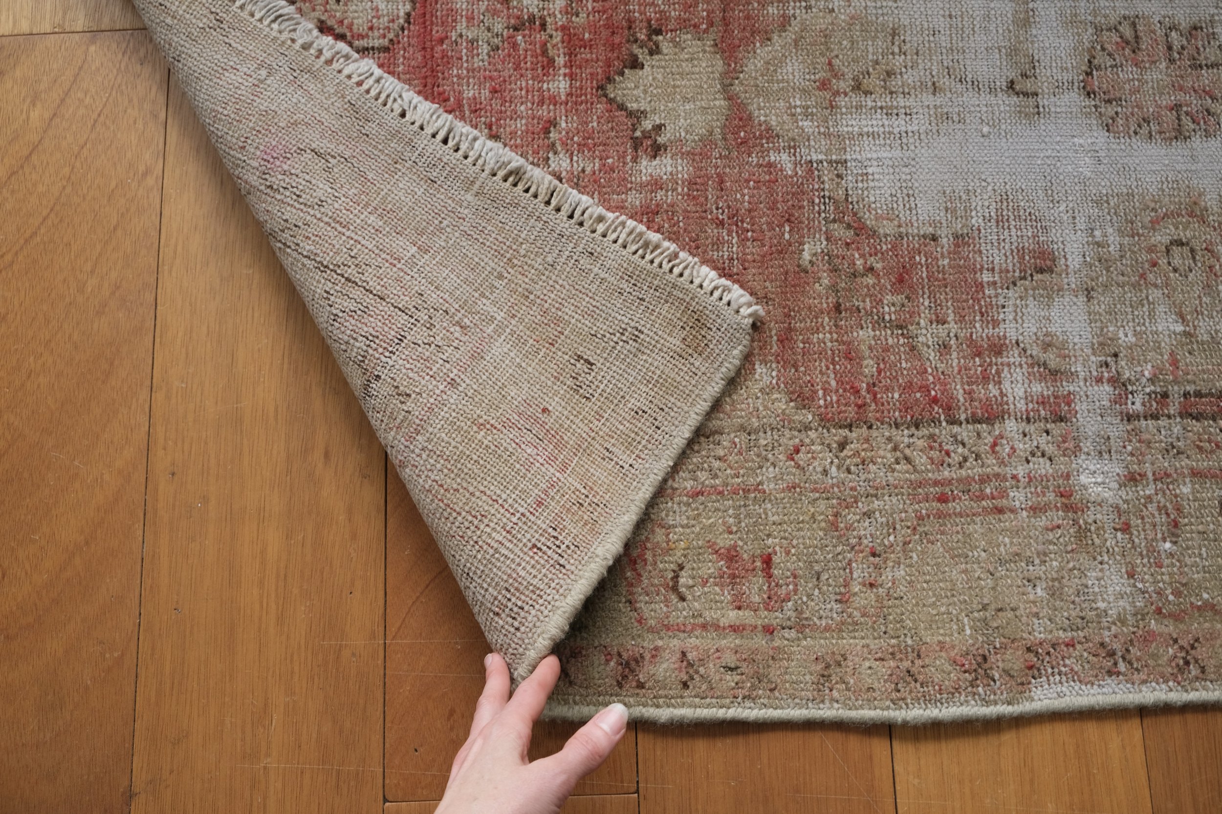 close up of rug showing hand knotted properties