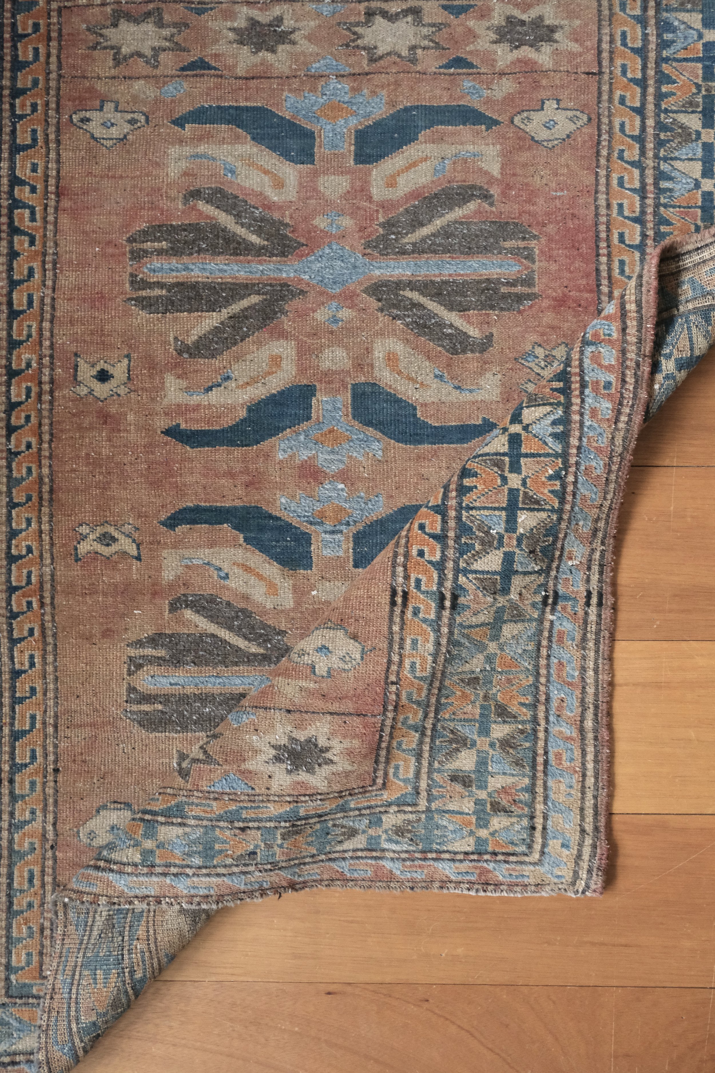 rug folded showing floppy handle