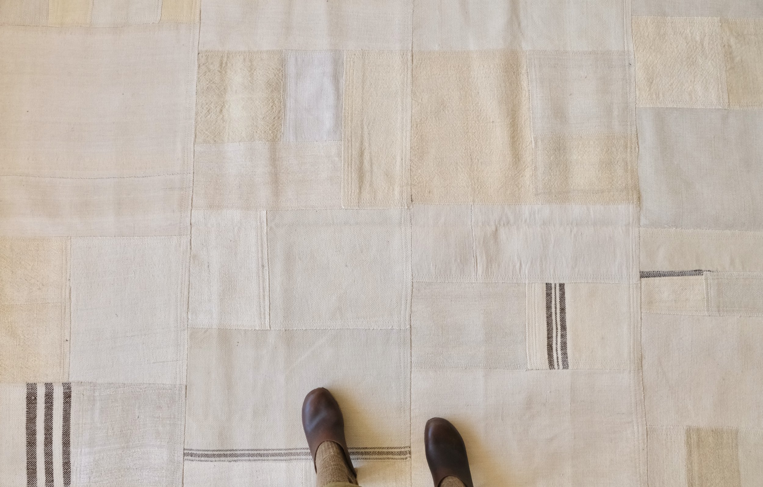 salvaged fabric quilted together