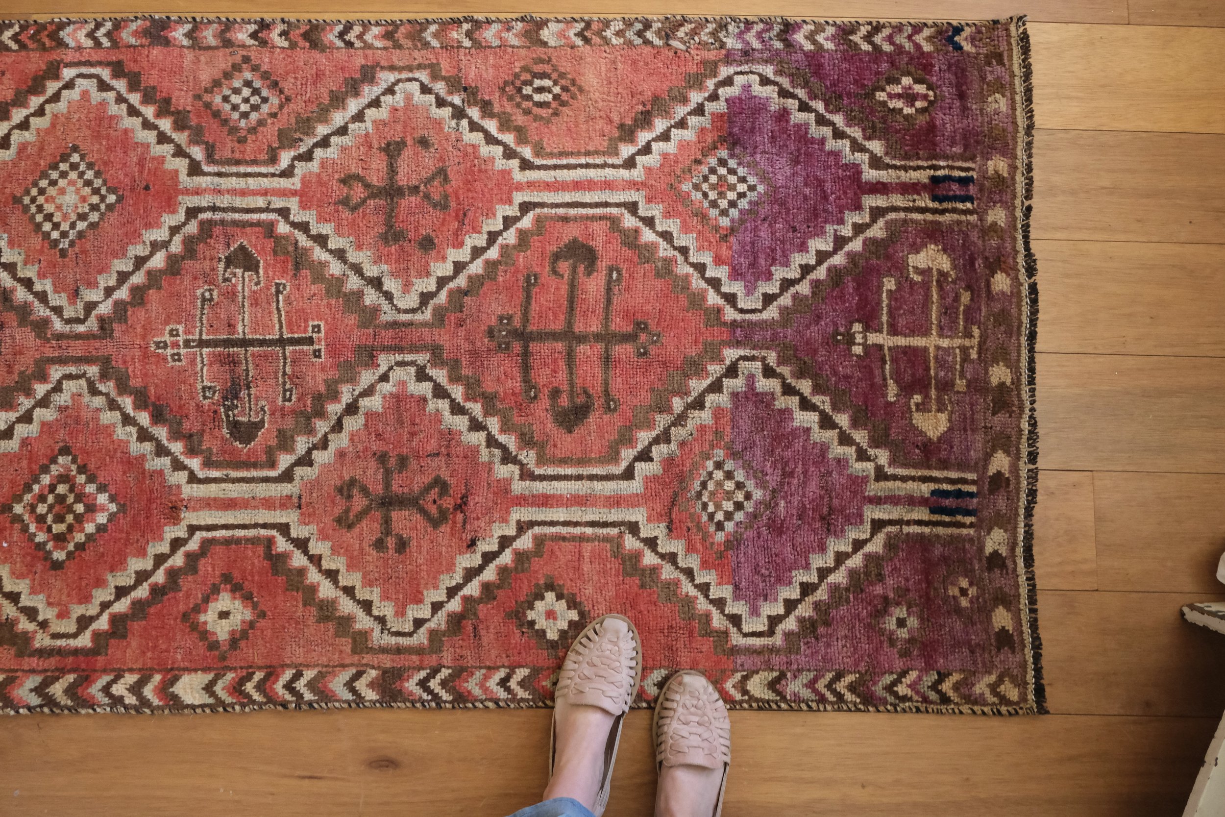 vintage shiraz rug in shades of candy apple and berry