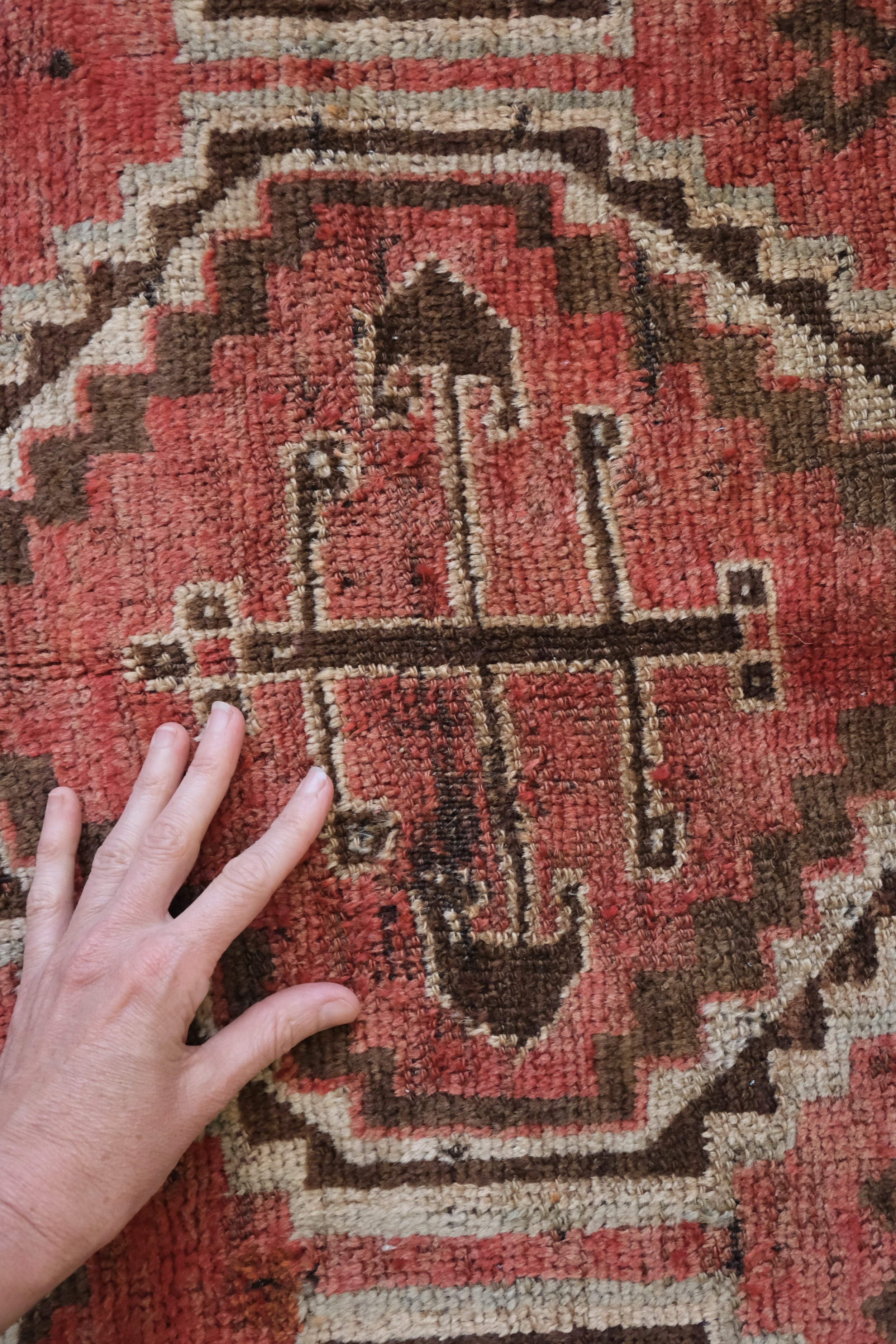 area of low pile on Persian rug