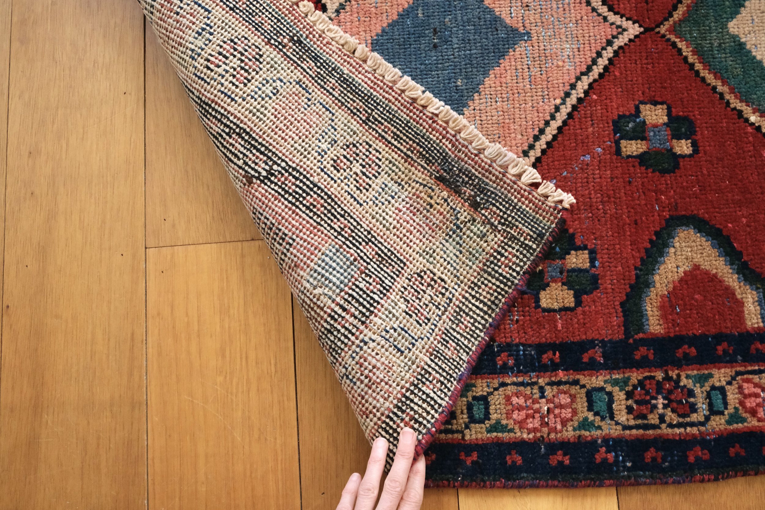 hand knotted back of rug