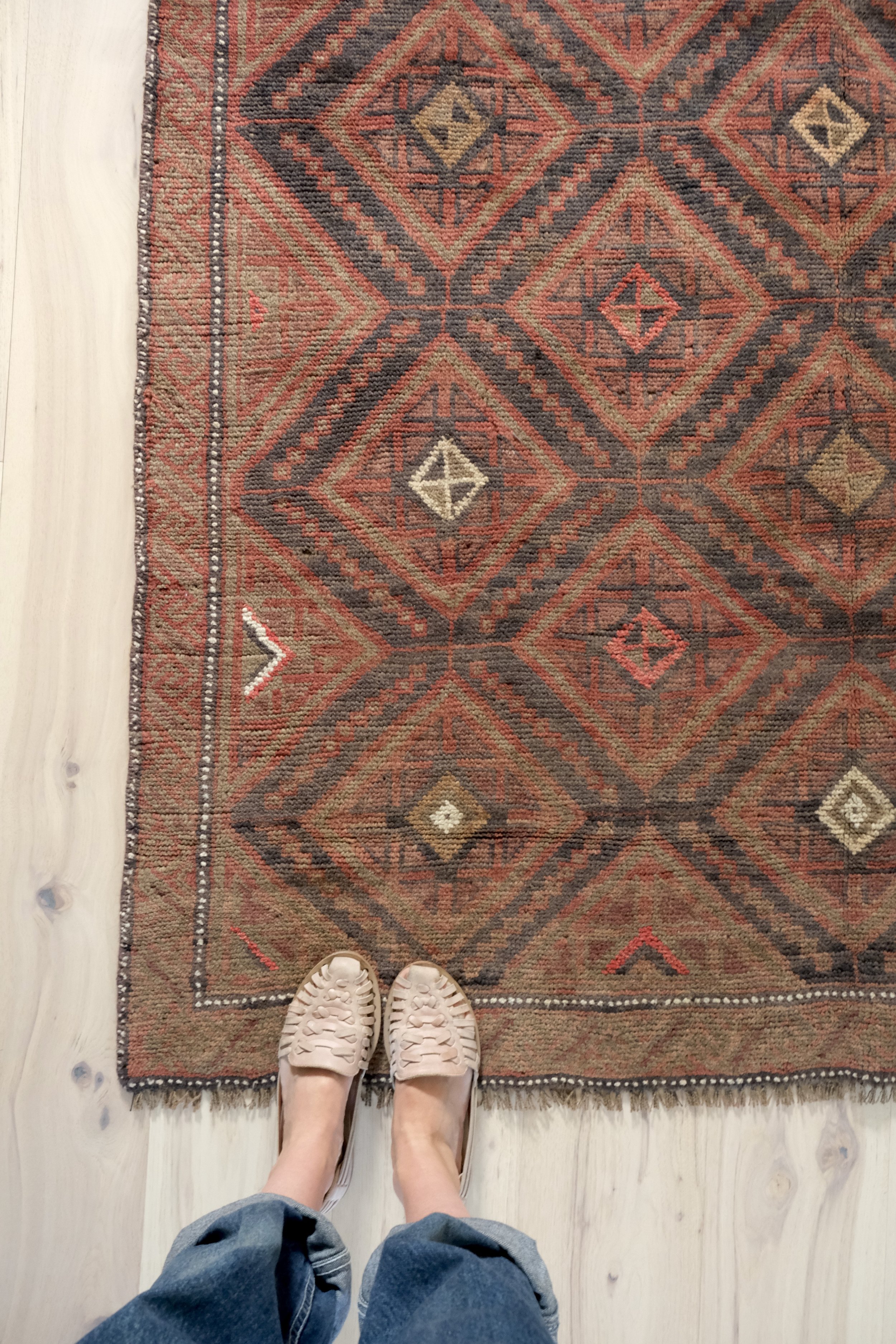 Geometric turkoman rug corner