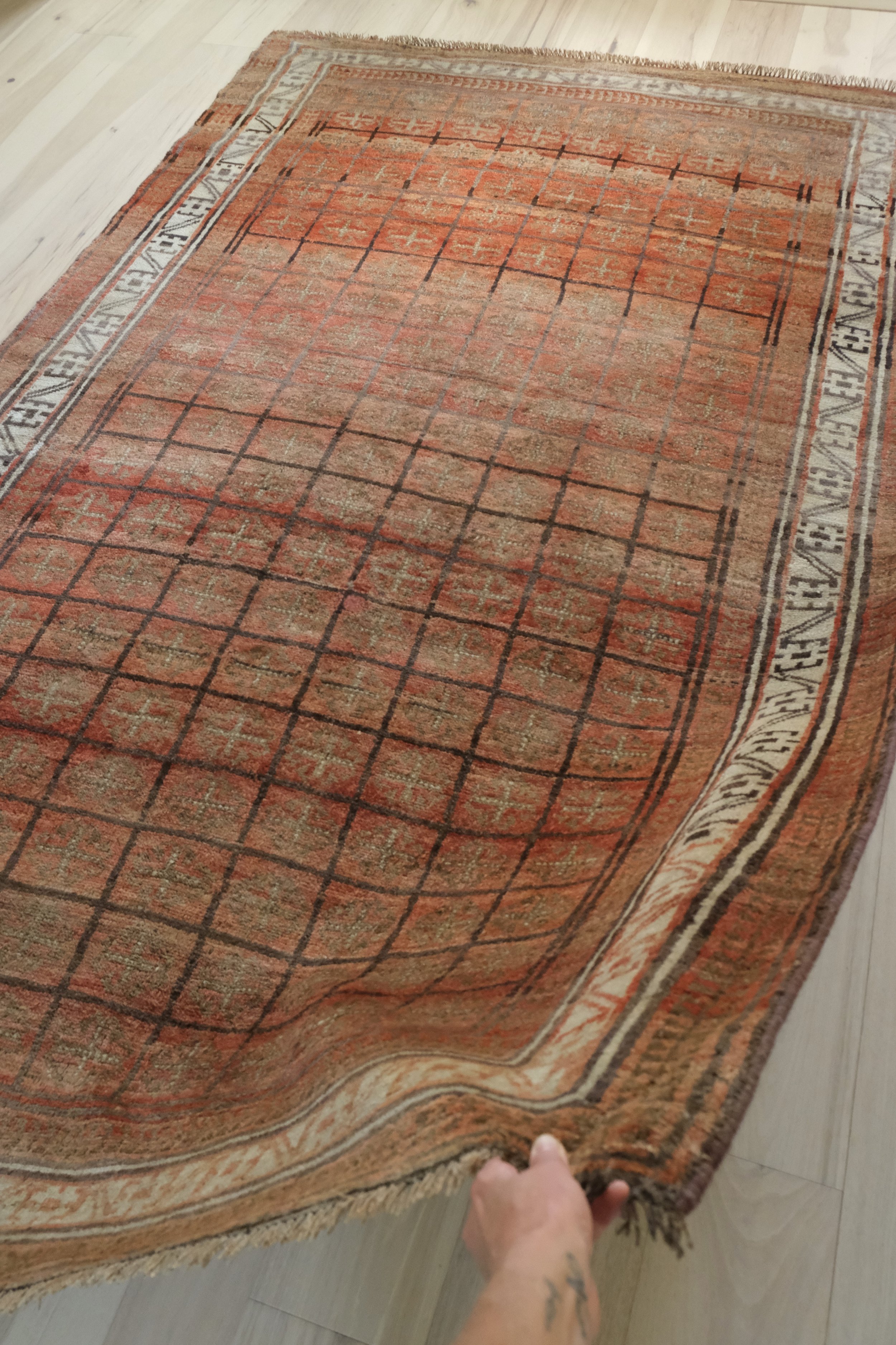 soft drape of Persian rug