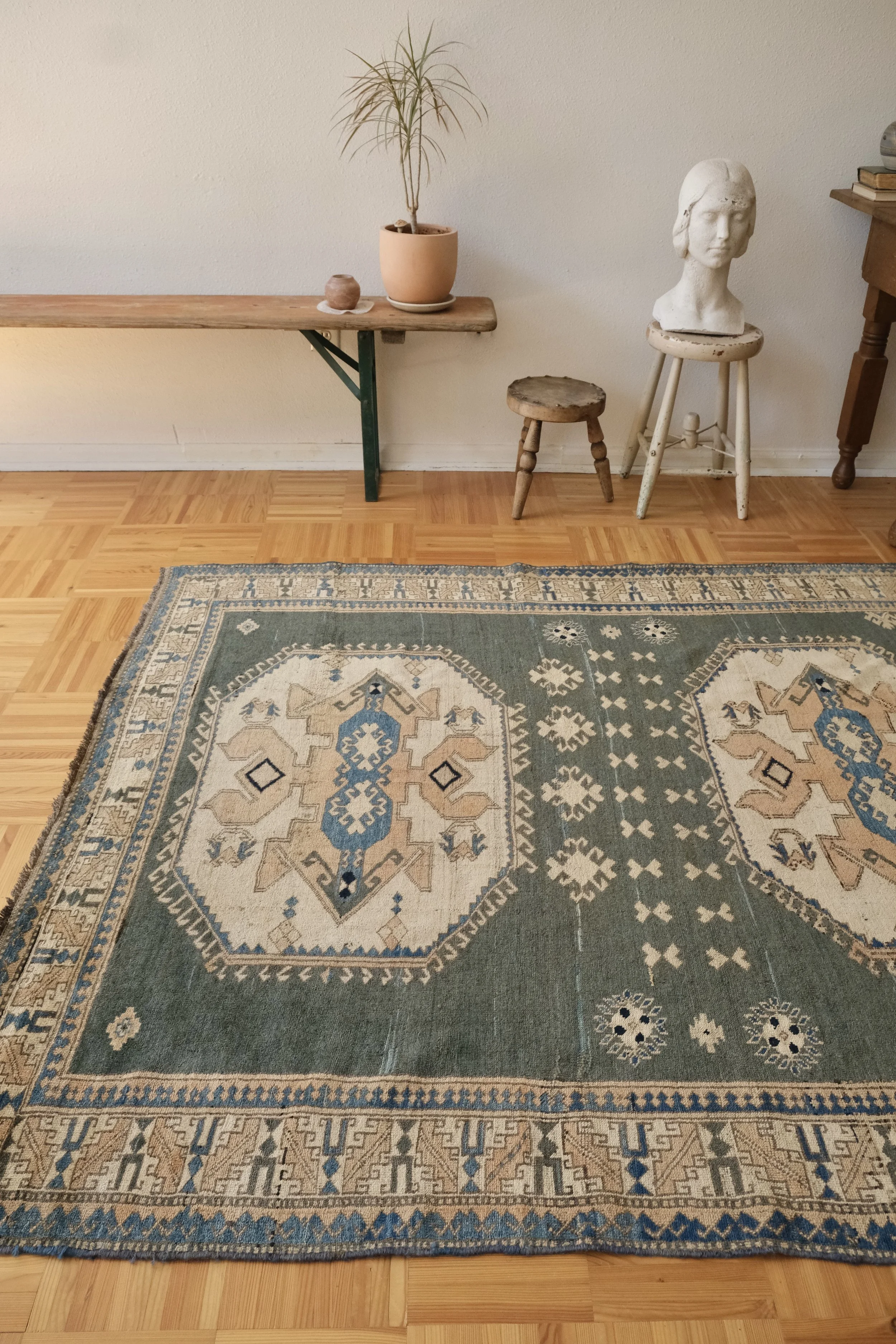 a rare green square rug