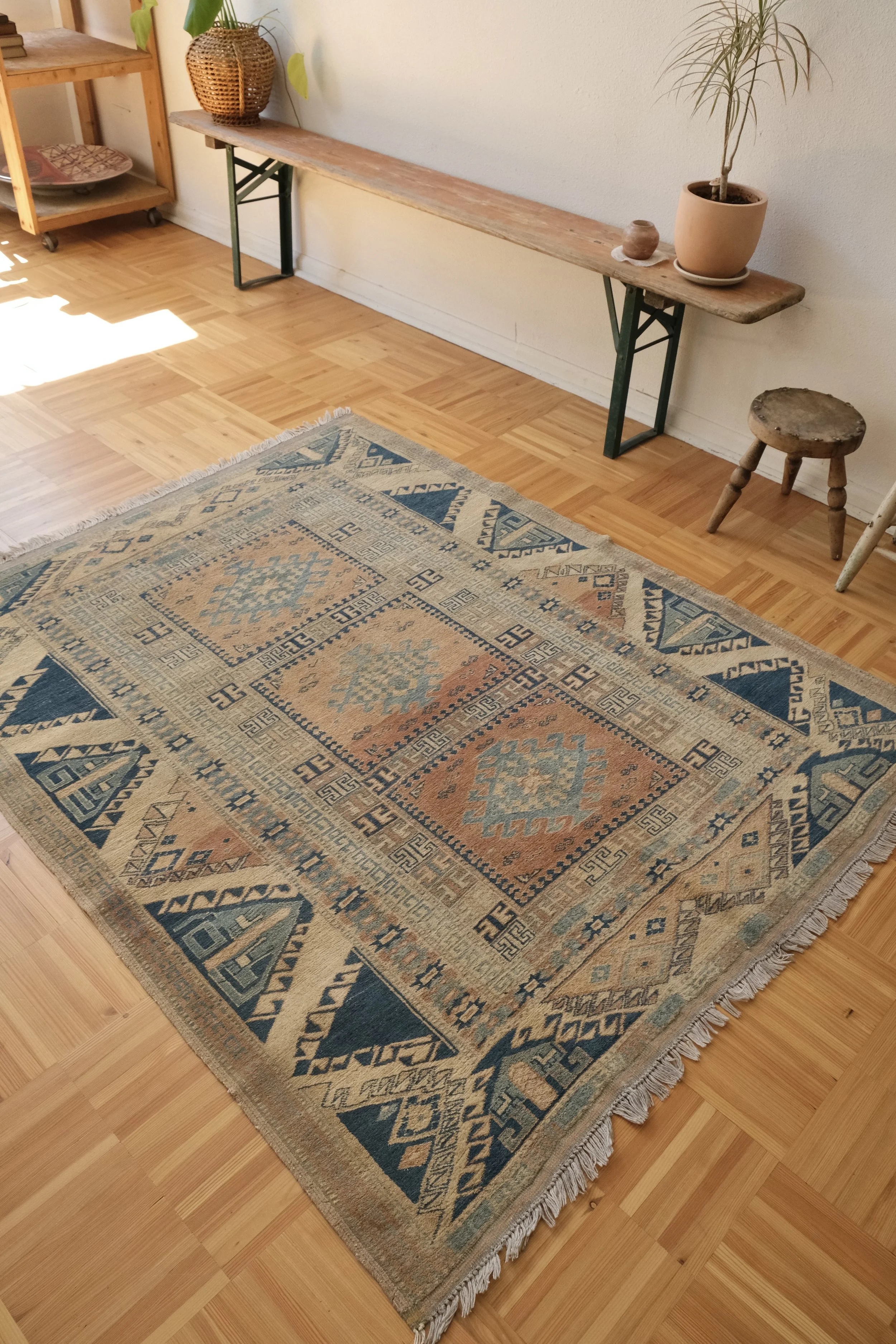soft and subtle colors for the rare vintage square rug