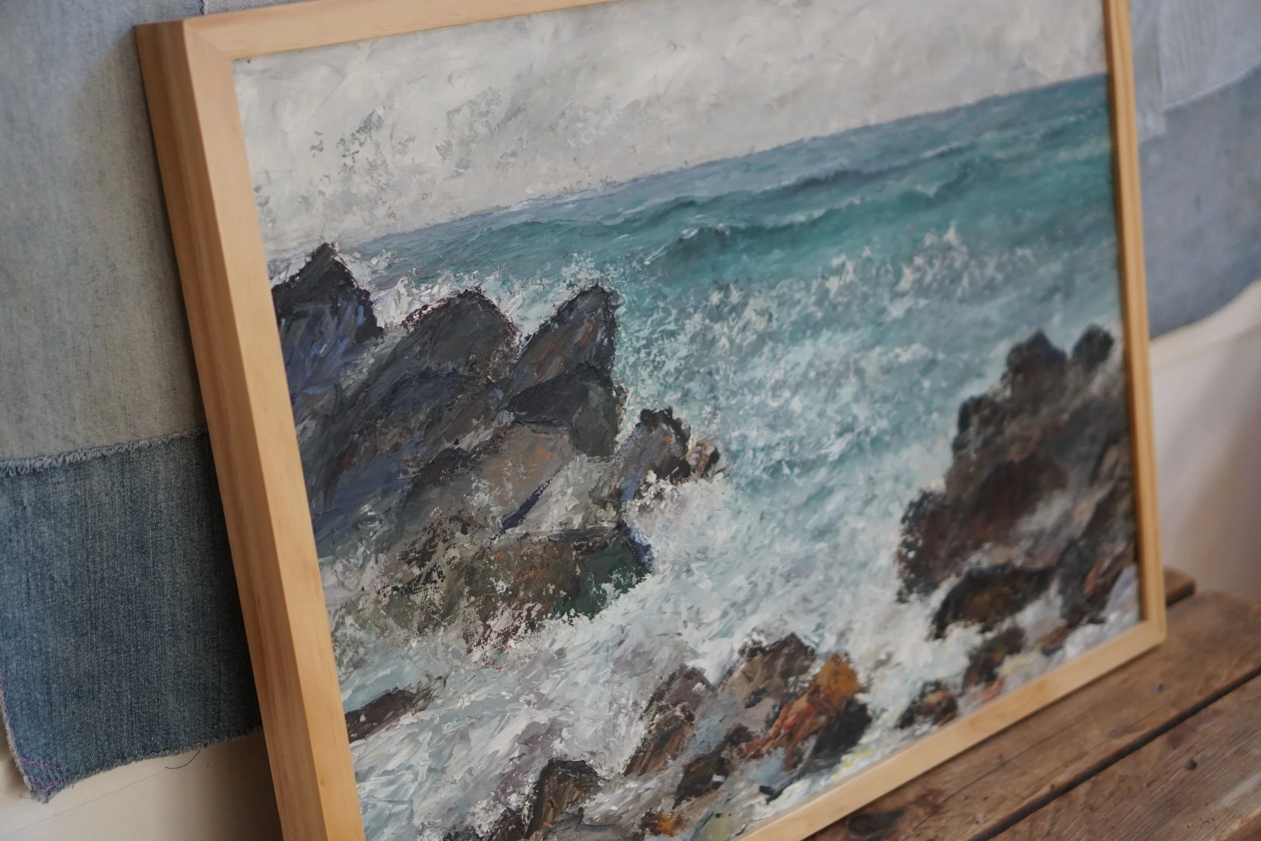 framed seascape painting