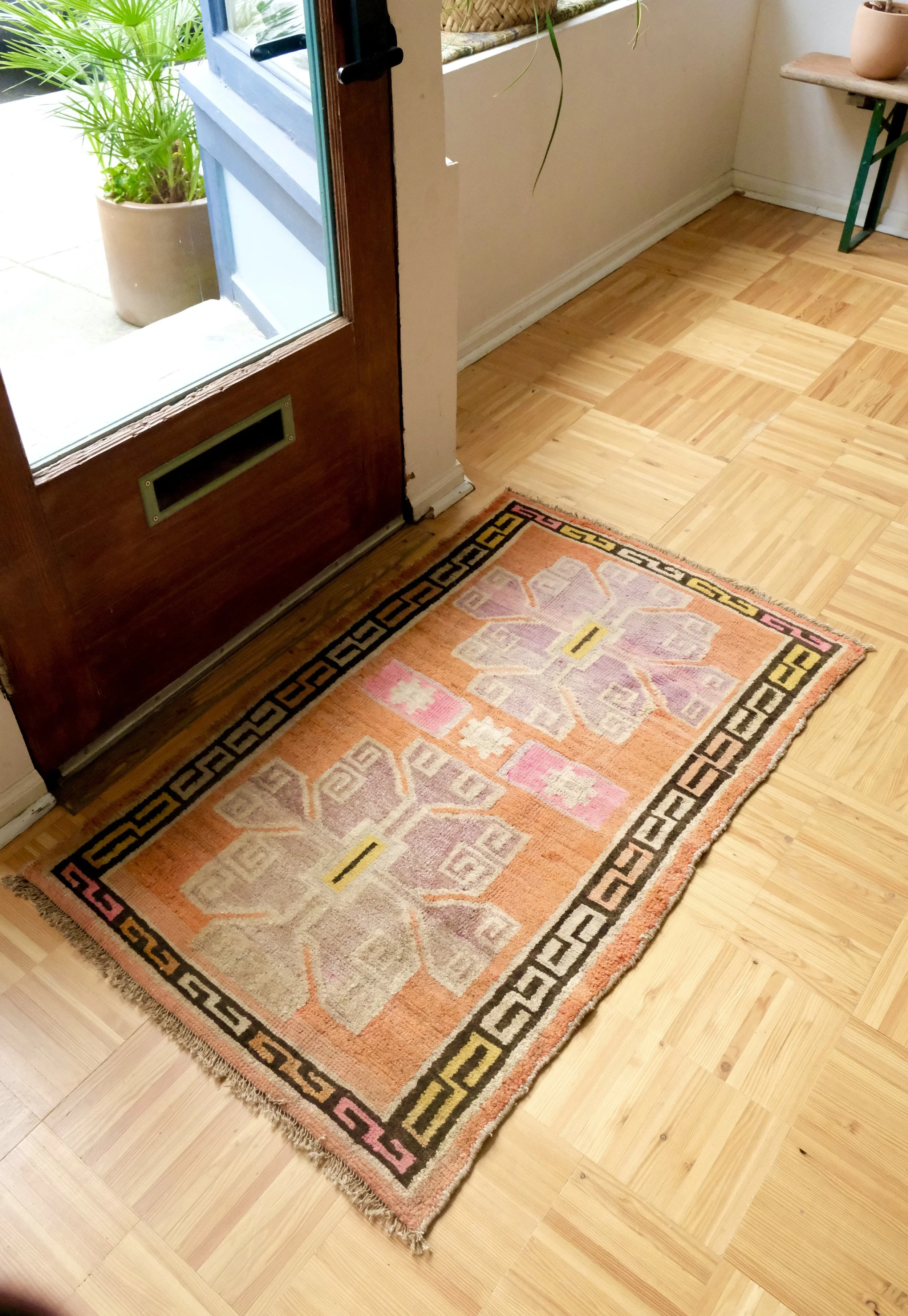 vintage rugs as doormats
