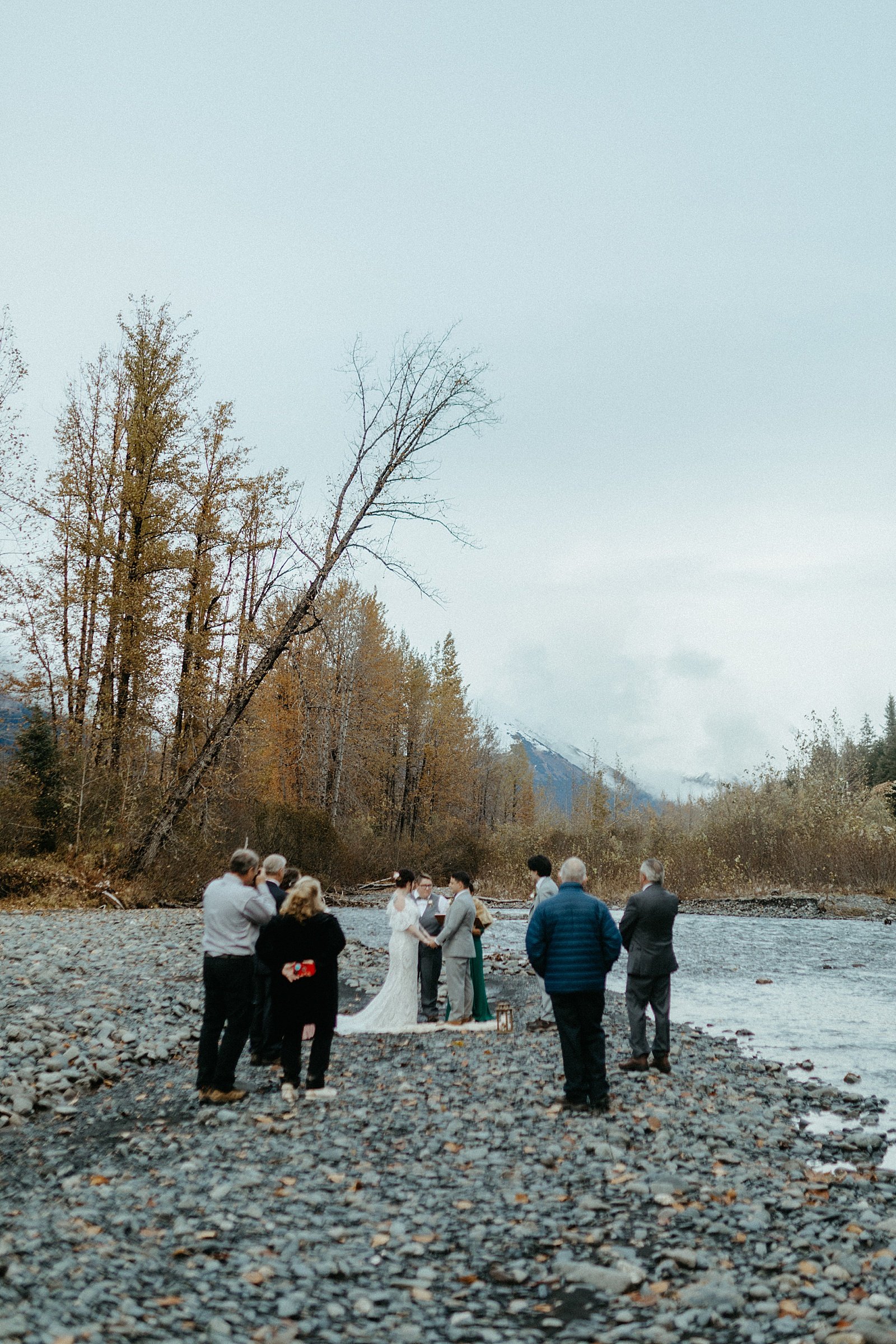  Small intimate Girdwood Elopement on the banks for a river in Alaska. 