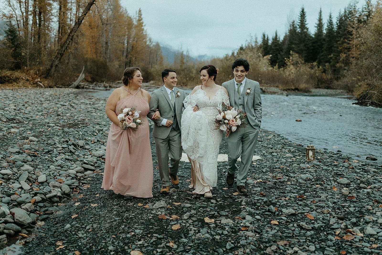  Small wedding party in gray and dusty pink on the river bank  
