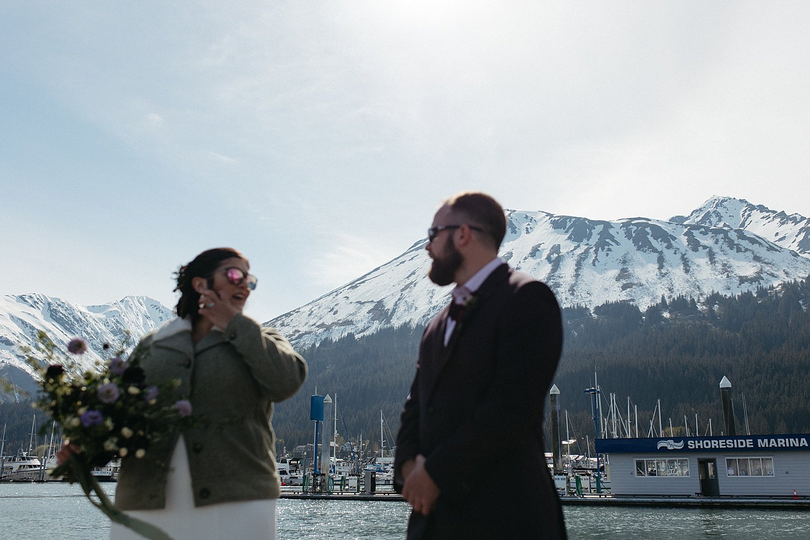  Couple standing in front of a mountain for Seward adventure elopement 