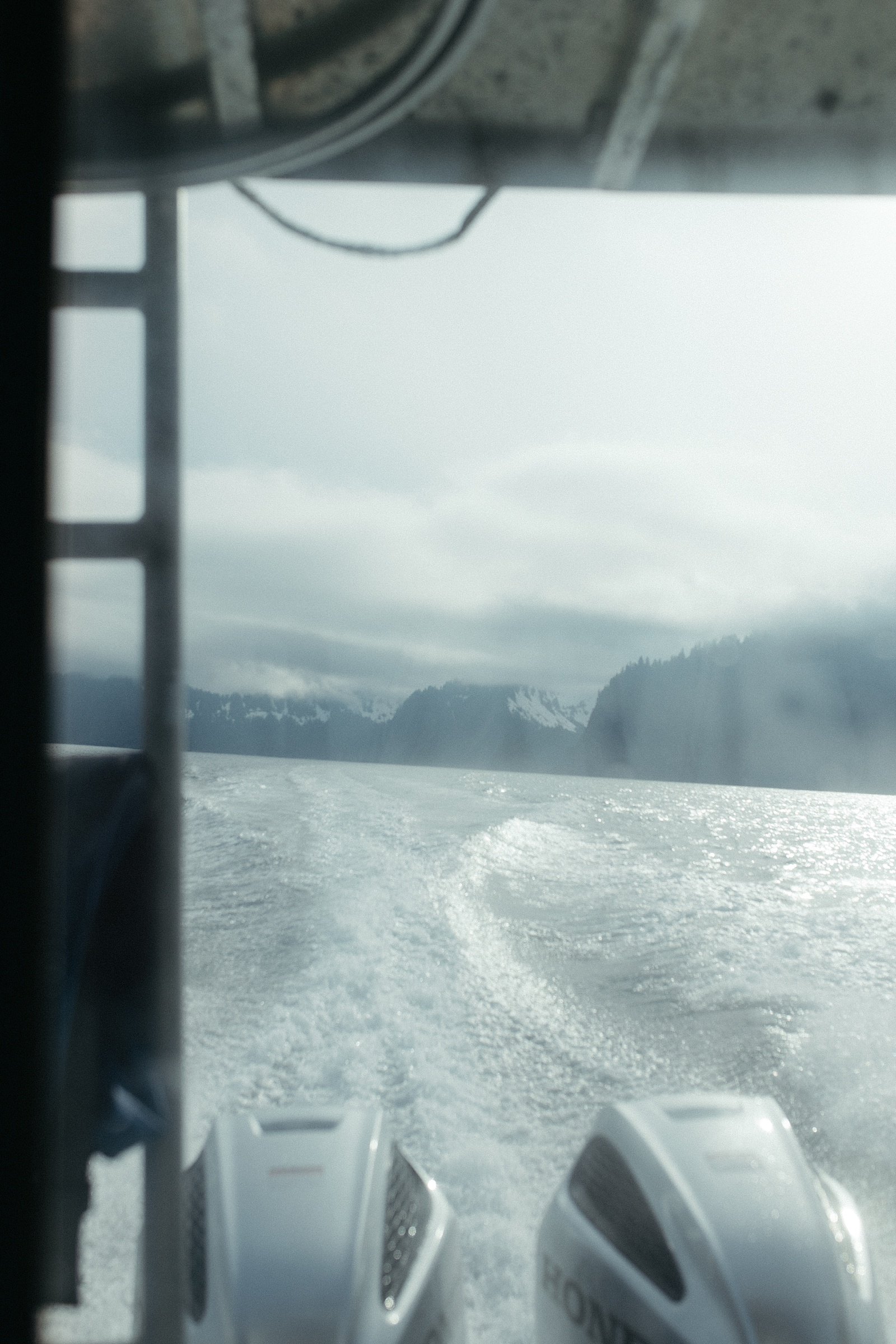  Water behind the boat on the way to a wedding ceremony by an Alaska wedding photographer 