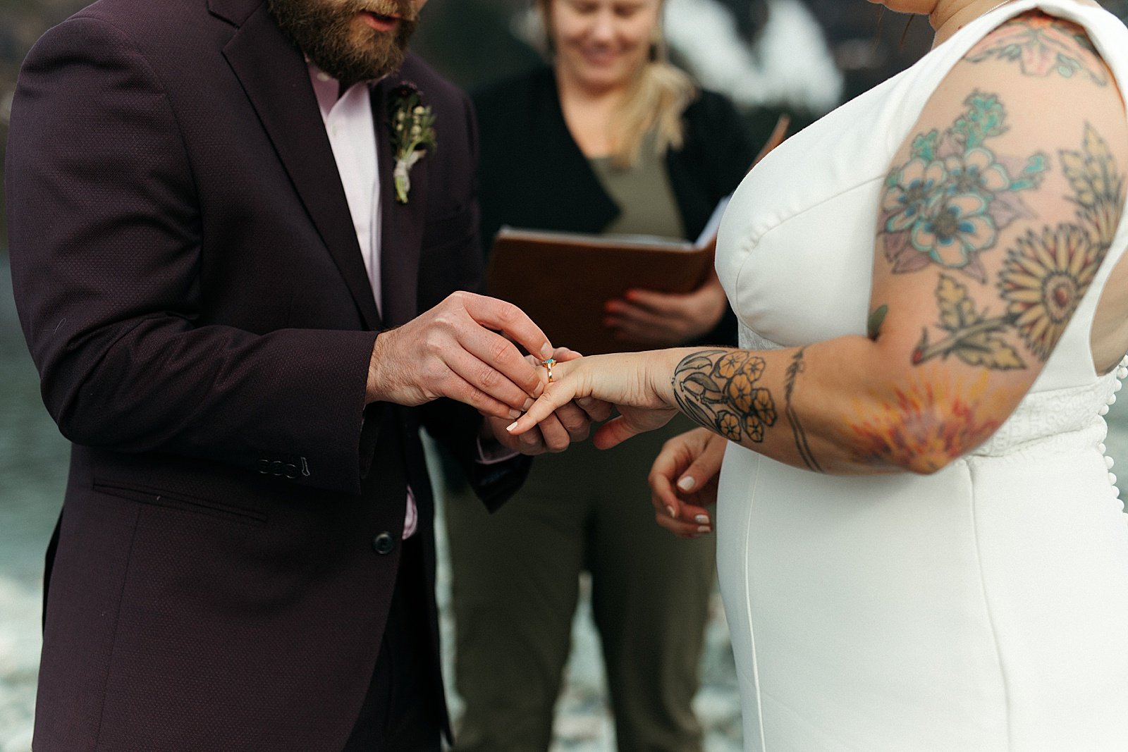  Bride and groom exchanging rings at their ceremony by Rachel Struve Photography 