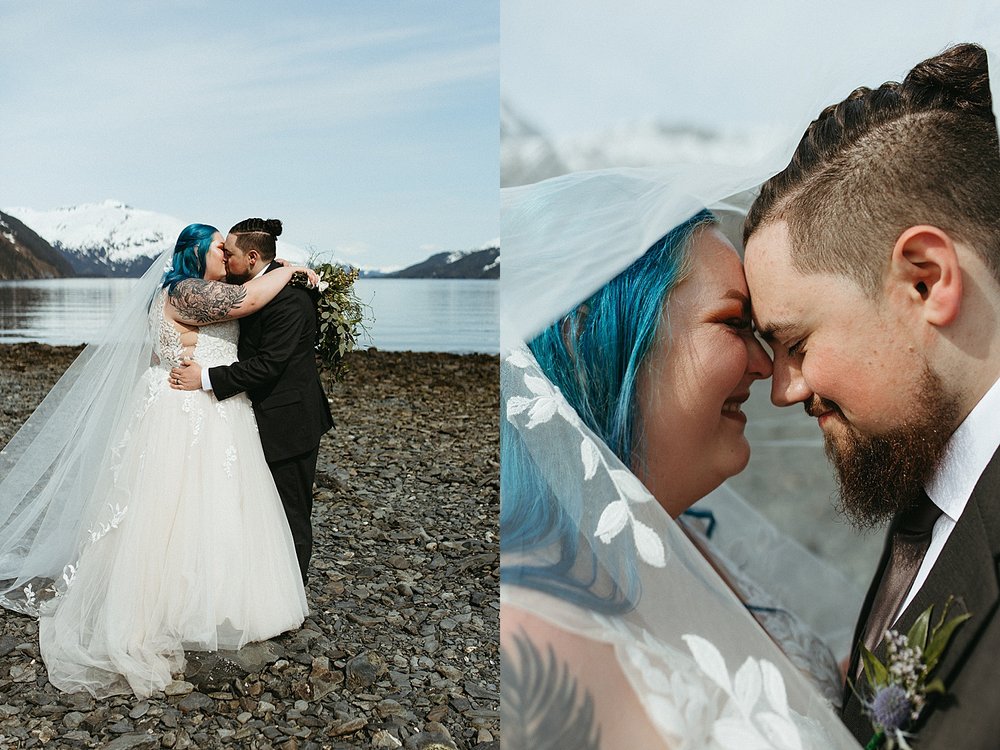  Newlyweds in front of the water embracing for an intimate beach elopement in Girdwood 