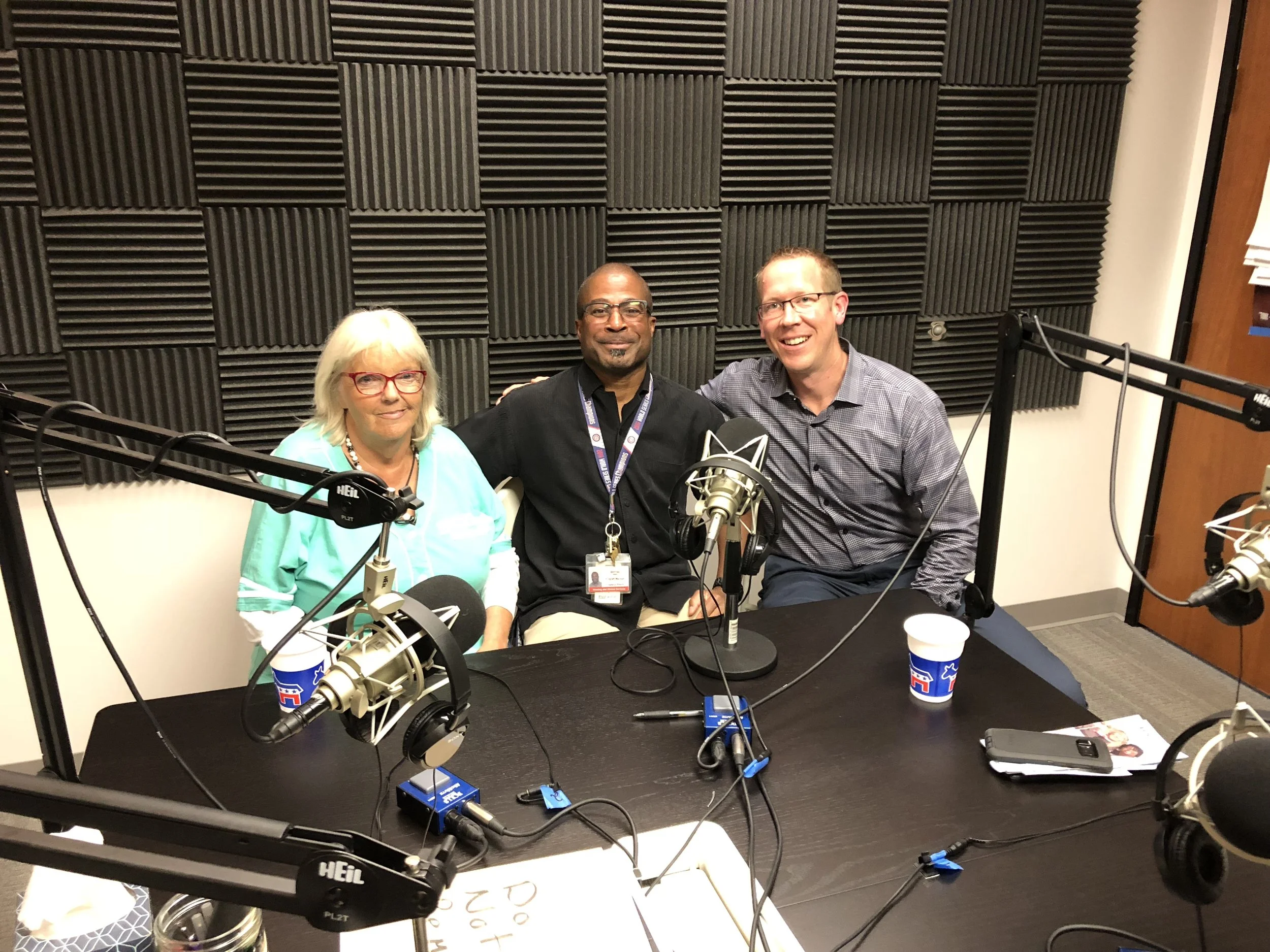 From left to right: Laura, Bernie, and Greg sit down in the ‘Homeless in San Diego’ studio