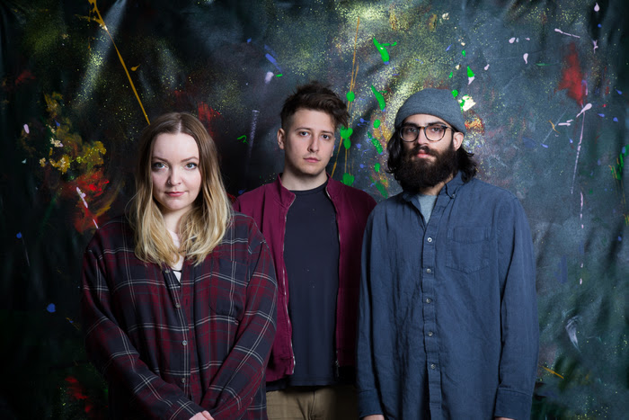 Canada’s Basement Revolver follow up the release of 'Baby' with 'Knocking' the second song to be taken from their forthcoming album 'Heavy Eyes', due for release via Fear Of Missing Out Records on 24 August. It's been over two years since Basement Revolver released their debut single, 'Johnny' and what immediately stood out for me when I reviewed the song was the effortless way I could put movie visuals to their music in my head. Since then, that (mostly) still applies and 'Baby' sky rockets to such spectacular heights it could rival the storytelling of anything you could see in the cinema. Basement Revolver's songs are more than words and sounds, they are windows into life's most emotional, painful moments and remind me of those artful, evocative climactic scenes in film where romance and angst and longing are deepest, rawest, richest. Those introspective, lonely, weary and self examining moments that tug on the heart strings and remind us of the frailty of the human condition. Those heart-stomping moments that you feel like you'll never recover from. One of my favourite things about Basement Revolver is that every band member is integral to the sound they are creating. I know that sounds kind of stupid because shouldn't all band members be important to the band? This is different. Basement Revolver are special in that it's really hard to pick a favourite moment or sound or melody from their music. Everyone works like a well oiled machine and you get immersed in their music. But Chrisy Hurn is an incredible front woman. vulnerable and raw, beautiful and gritty. I never tire of hearing her voice, or her storytelling and 'Knocking' is one of the band's most exposed and stripped songs to date. There's a softer soundscape at work via 'Knocking', which doesn't take away any of its potency. In fact, it really appeals to my fondness for ethereal and ambient folk because of it's organic and relatively sparse composition (without losing its reverby indie rock edge). Hurn's vocal has a lot of space to find catharsis, redemption and fight her demons as 'Knocking' sees her reconnect with her faith and her God. Whether religion plays a part in your life or as in my case, it does not, 'Knocking' really is a gorgeous song that has a way of silencing and soothing its listener. And maybe the reverence and intimacy of the track means its the first one yet that I have not been able to add a film script to in my head. But you know, in this instance, I'm more than ok with that. Words of Karla Harris