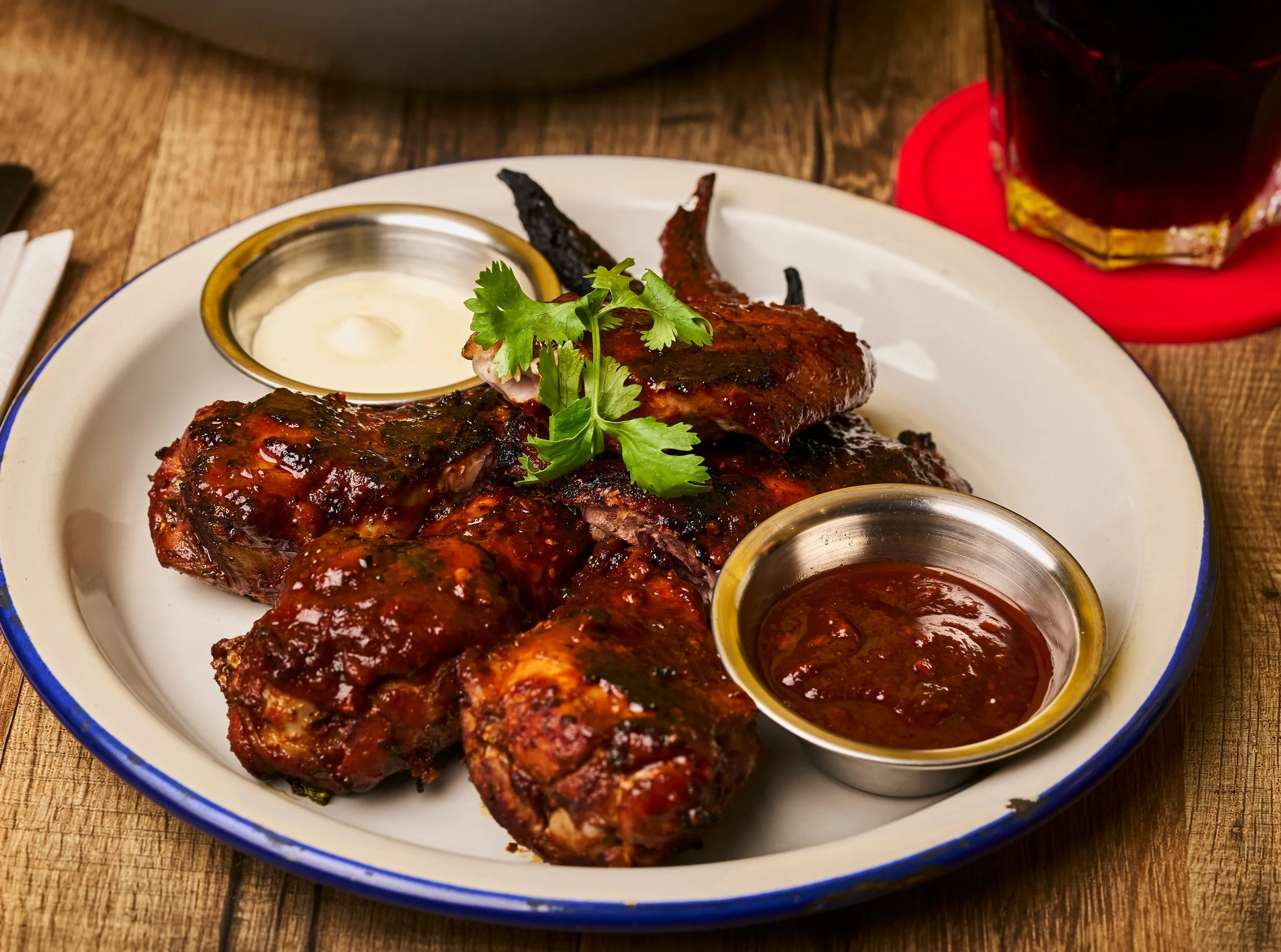 This is your sign to try our Housemade Smoked Wings! 🔥🍗

Smoky, spicy, and packed with flavour, these wings are coated in a fiery chipotle glaze, paired with cool sour cream and pickled jalape&ntilde;os for the perfect balance of heat and tang. 🌶️