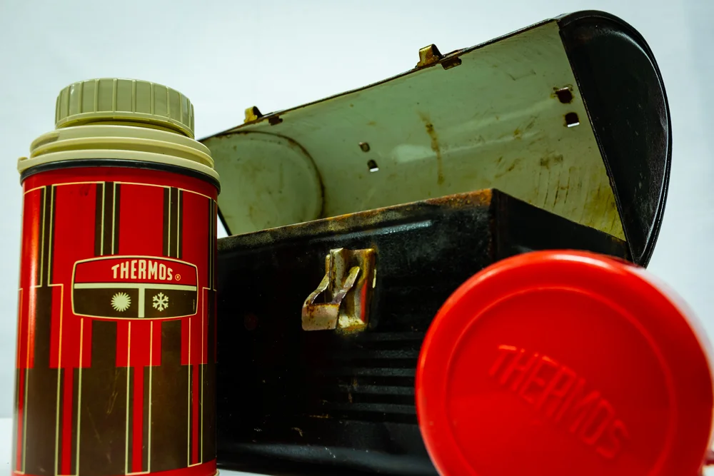 Vintage lunch box and vintage Thermos