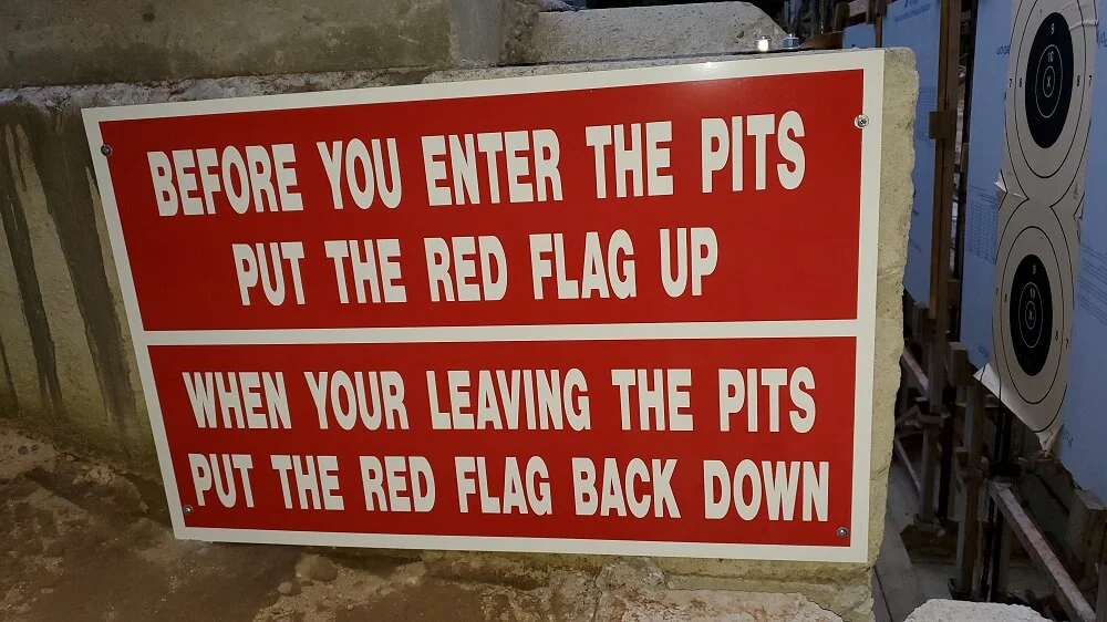 This is in addition to the flag placed up range just in front of the firing line.