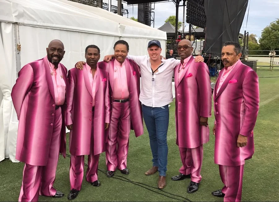 Robbie with the temptations