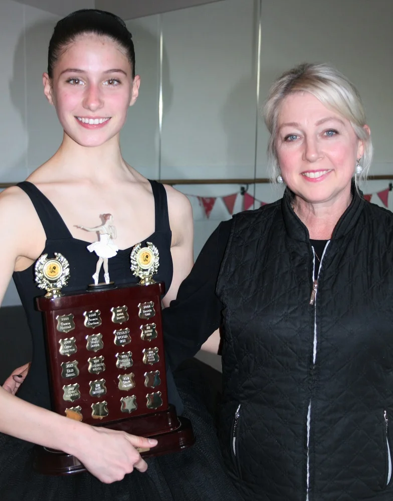 A lot of hard work, Claire with the Betty Keirnan Memorial Trophy and her teacher, Suzanne Duffy, Principal of Colour City Dance