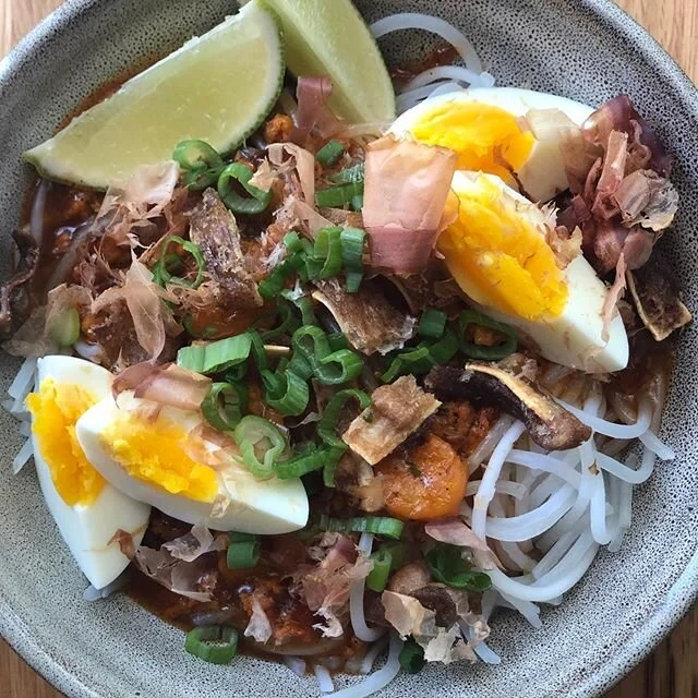 Palabok! rice noodles, shrimp and pork annatto sauce, pig ear chicharron, bonito, egg ($12)
&mdash;
We&rsquo;ve updated our menu prices! Everything is under $15.