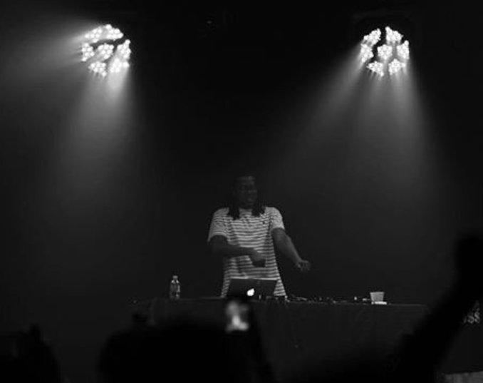 Above is a photo of Keyboard DJing at a Based world event.