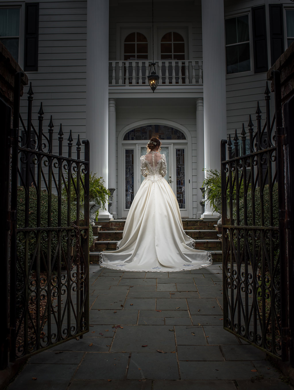 Bridal Portrait with Gates and Entrance at Matthews House in Cary NC.jpg
