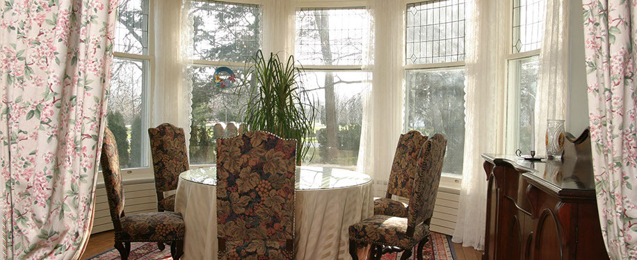  The conservatory with curved 100-year-old glass windows.   