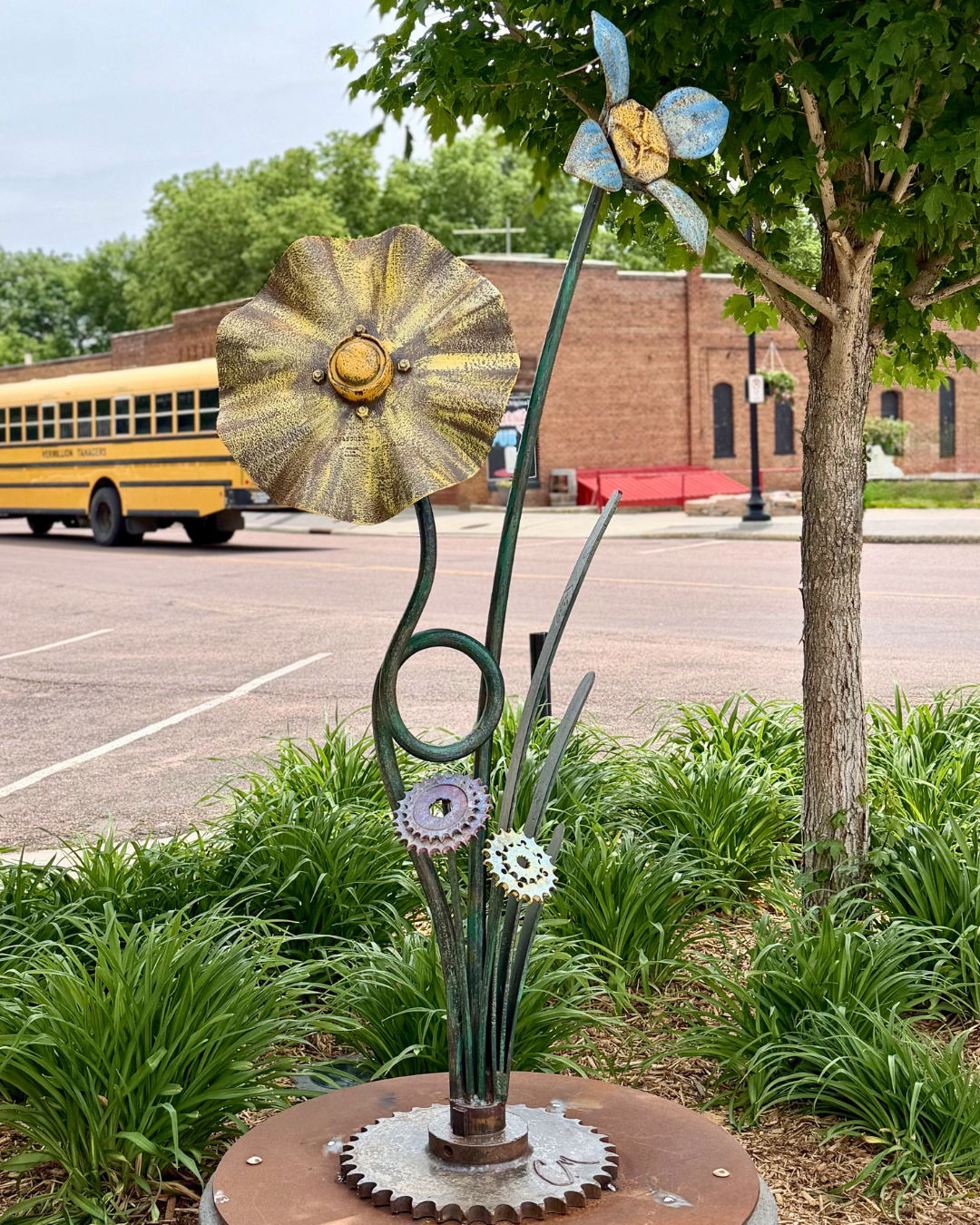 Flower Power, by Clark Martinek.
Located at the corner of Elm & Main Streets.