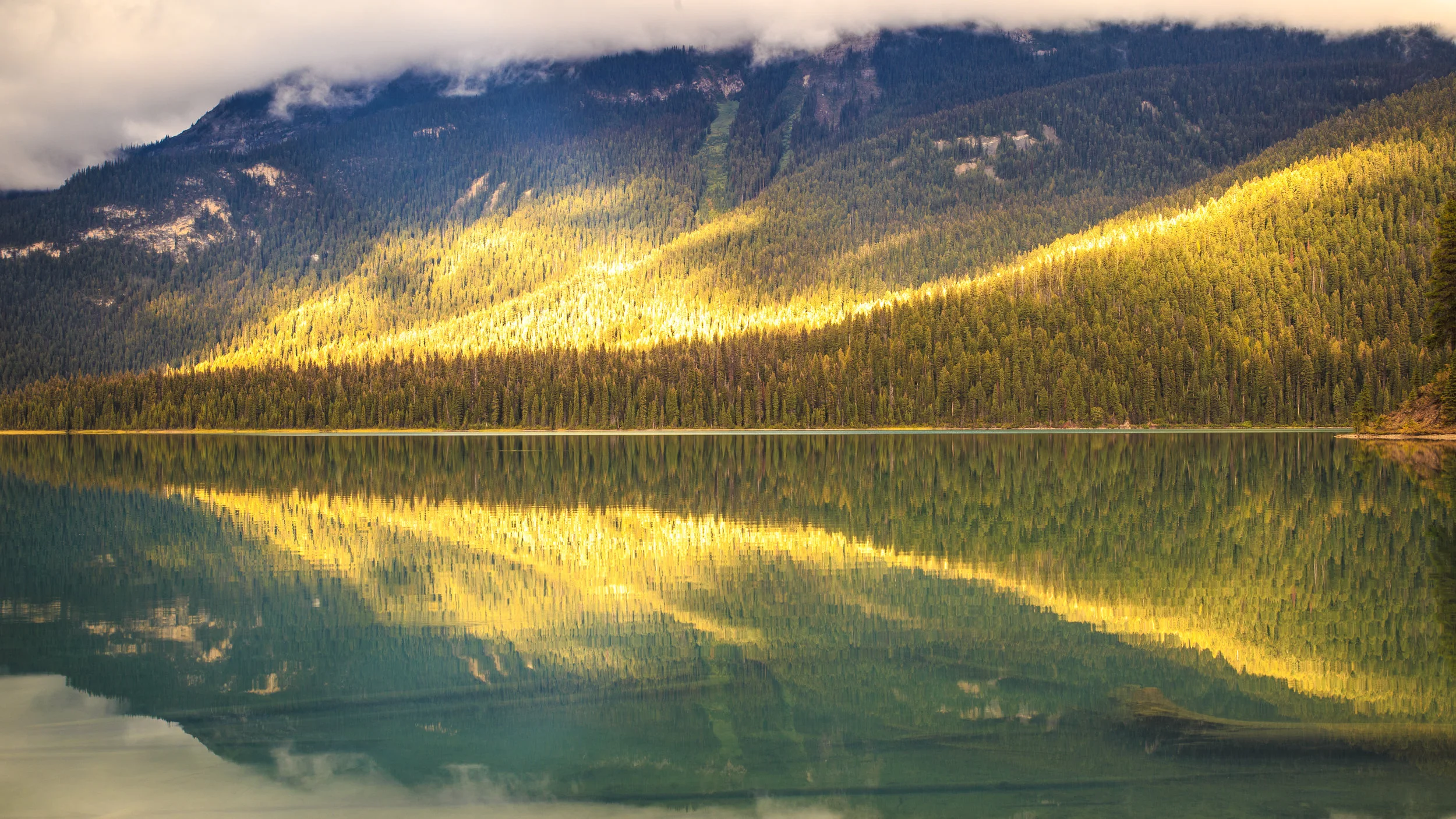 Emerald Lake Canada, light on trees, landscape photography, landscape photography to buy, landscape photography for sale, photos of mountains, lake and mountain, reflection in lake, rocky mountains