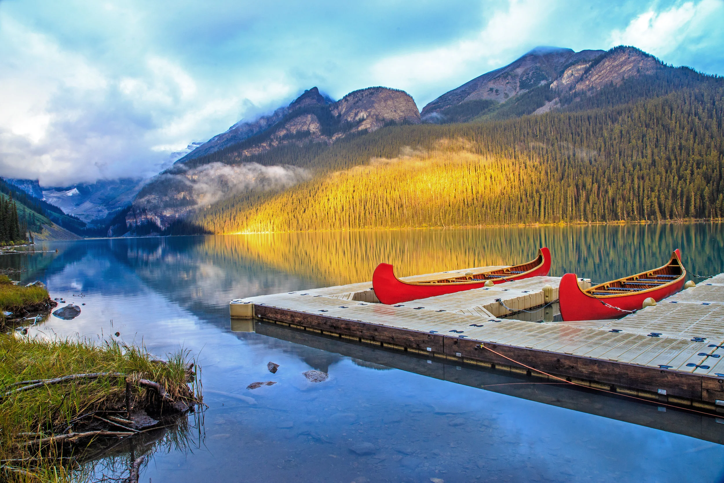 Part of the Light, Lake Louise, Landscape Photography, Landscape photography for sale, landscape photography to buy, landscape photography of rocky mountains, lake with red canoes