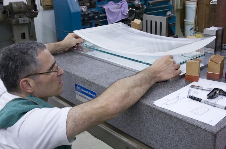 Positioning the bent casting blank for machining