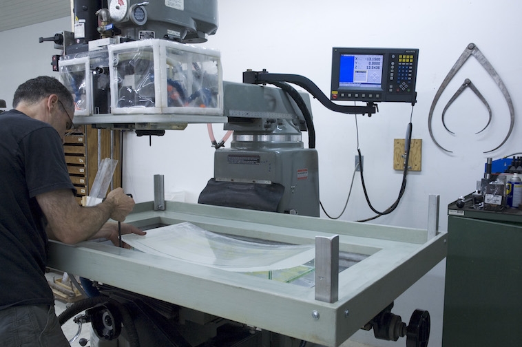 Securing the mounted glass on CNC mill