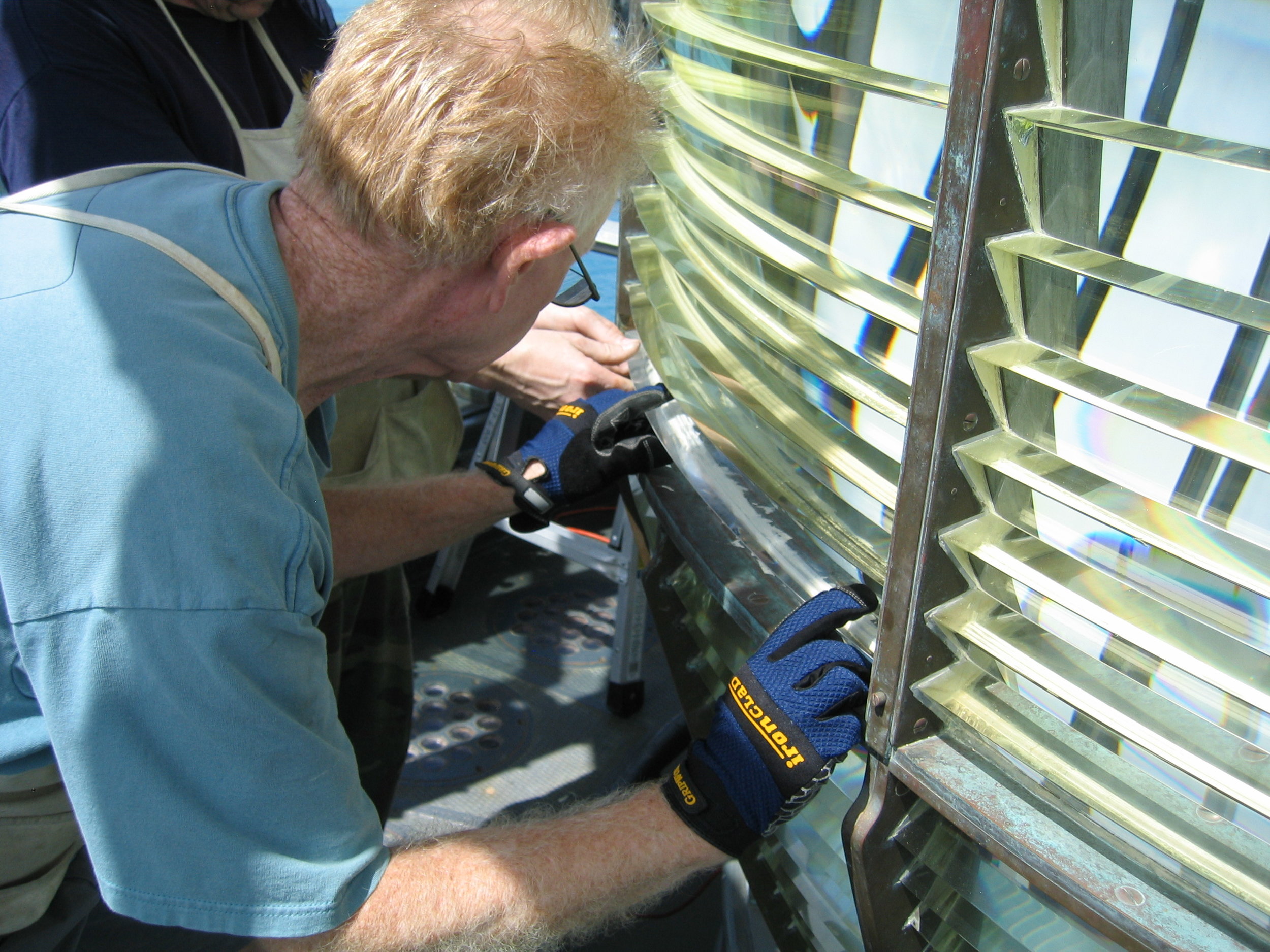 Onsite installation of Makapu'u prisms (photo courtesy of James Woodward)