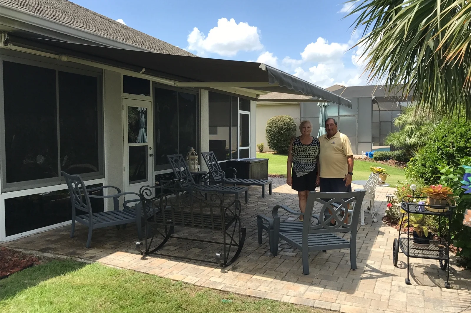 Happy Couple Under Retractable Awning Gainsville Florida