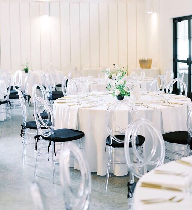 Modern + Classic 
We designed our beautiful, all-season reception space with bright, white walls and crisp, black accents.

Our exposed ducting, glass entryway, and custom chandelier give the timeless color-scheme a fresh feel and just enough persona