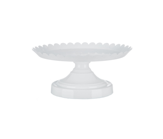white cake stand with scalloped edge