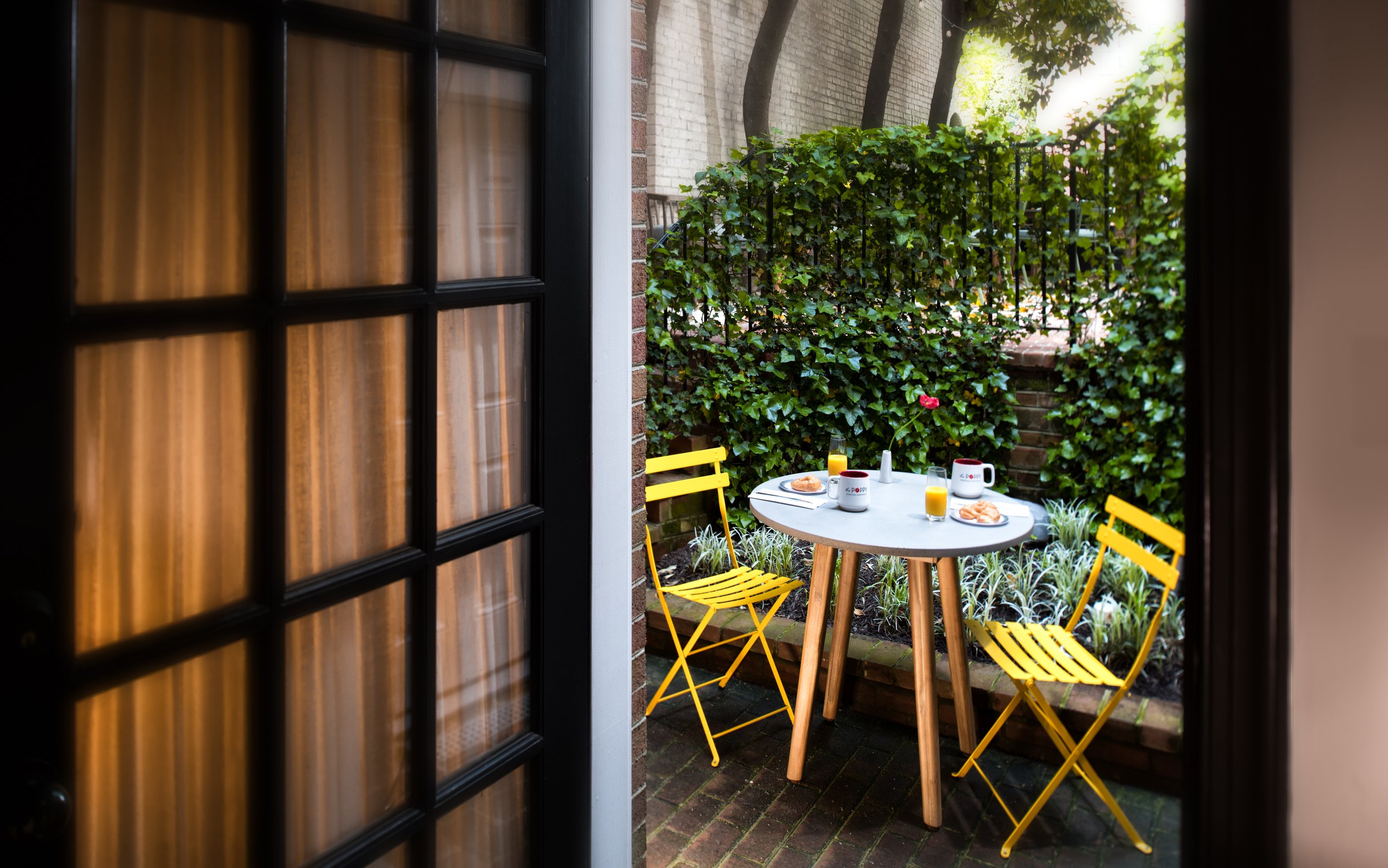 The Poppy Georgetown Guesthouse and Gardens_The Poppy King_Personal Patio_Room 12.jpg