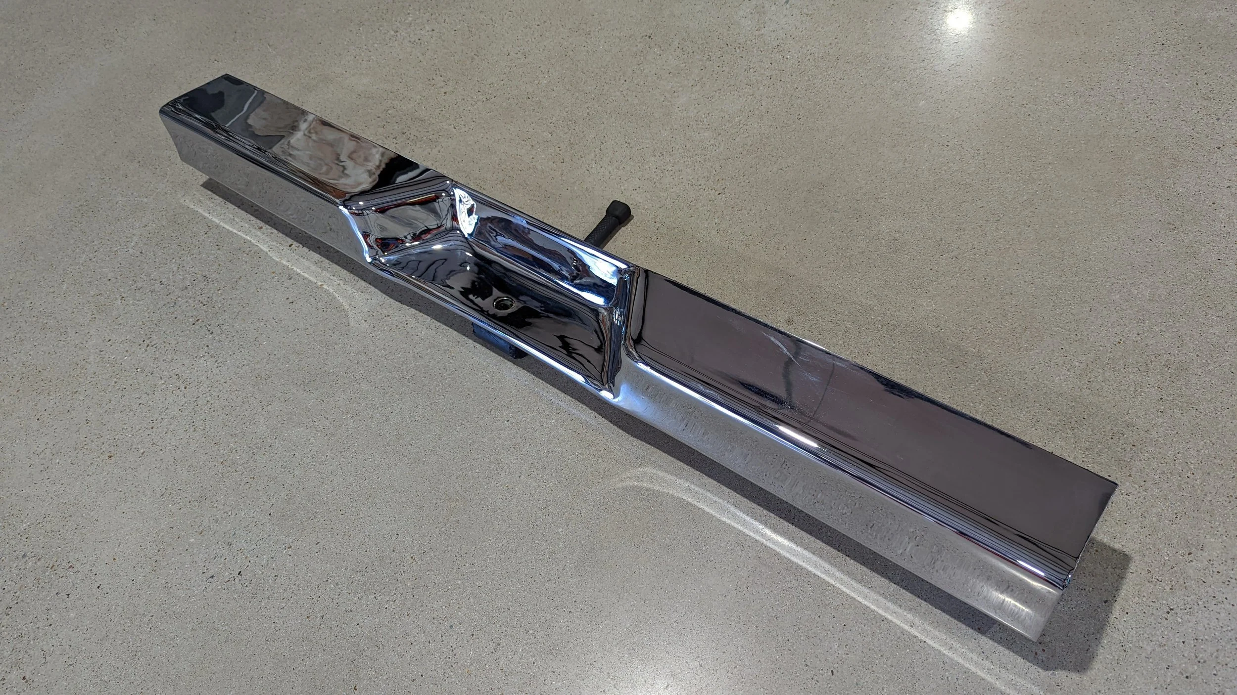 Rear view of Jeep SJ J-Truck chrome rear bumper with mounting points