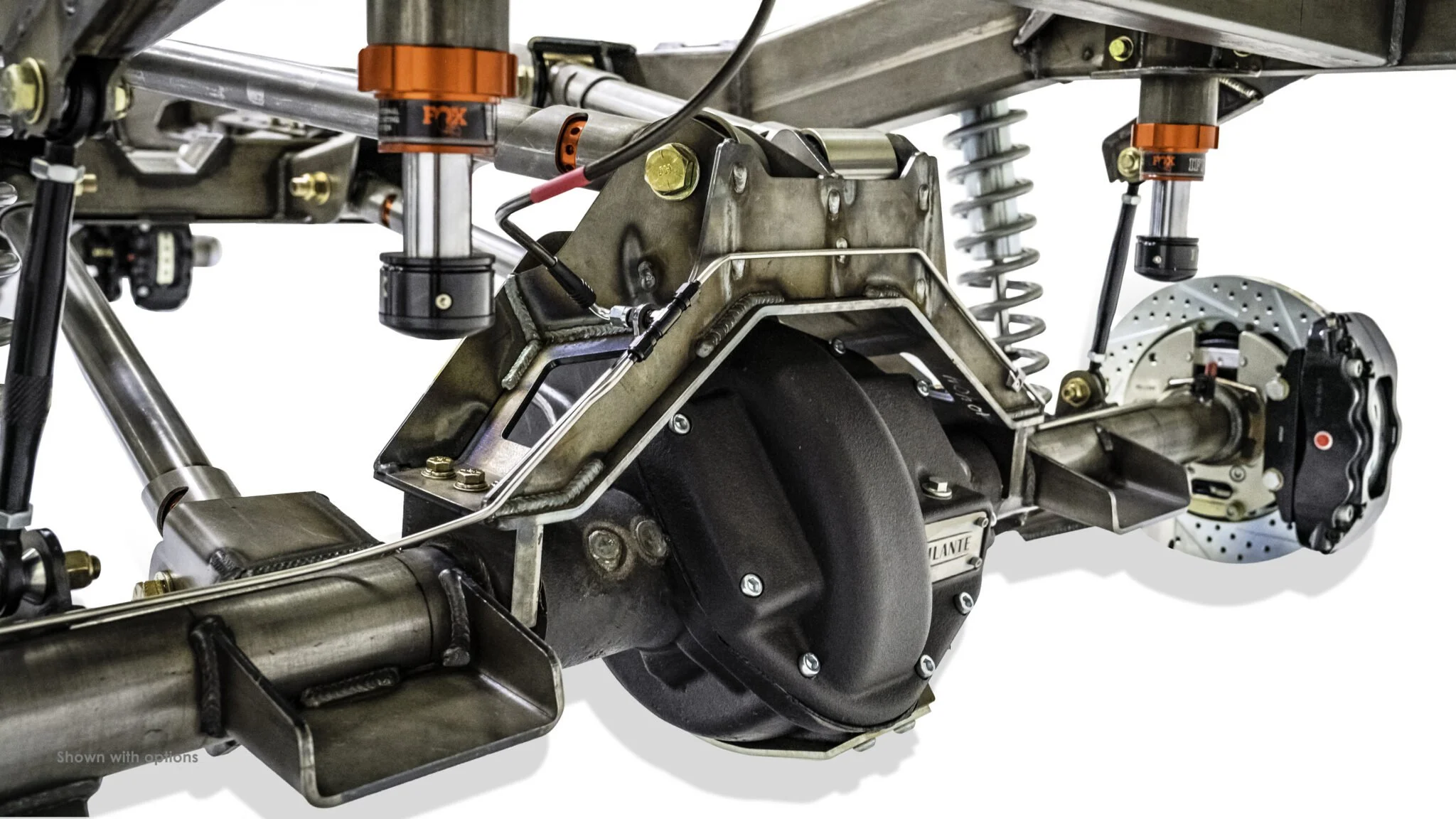 Full chassis overview of the Vigilante Rolling Chassis for Jeep Wagoneer and Cherokee, capturing the complete assembly with Fox coilovers, Dana axles, and Baer braking system.