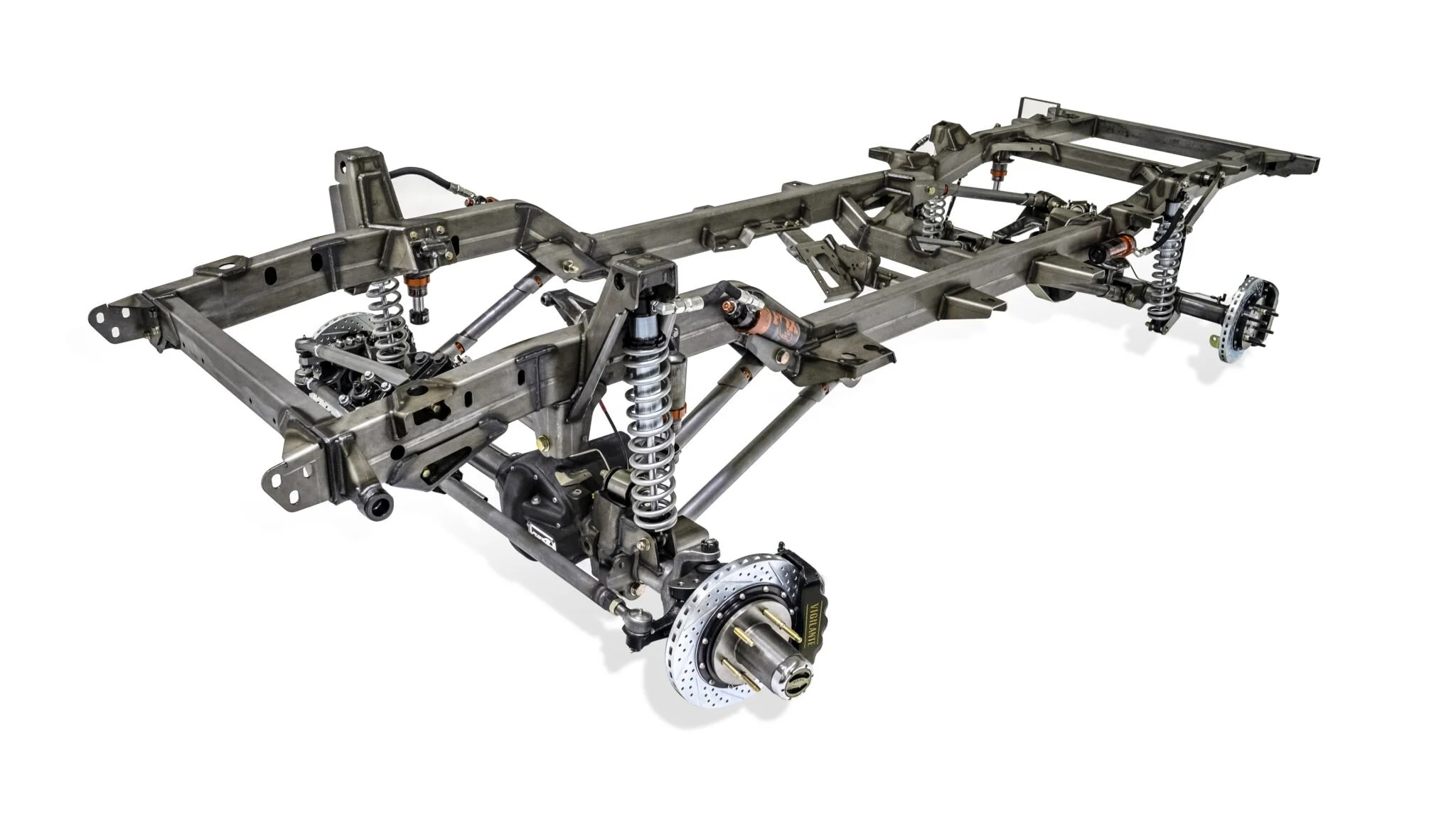 Front angle view of the Vigilante Rolling Chassis for Jeep Wagoneer, showing the fully boxed 5x2.5 frame rails, front suspension geometry, and precision weld craftsmanship.