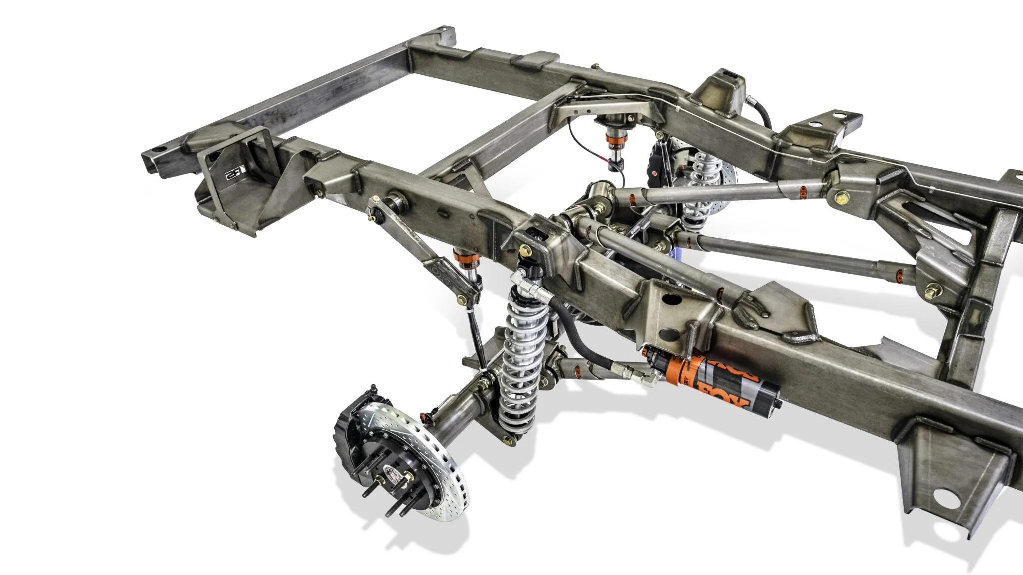 Rear three-quarter angle of the Vigilante Rolling Chassis for classic Jeep restorations, featuring the Dana 60 rear axle, Baer brakes, and RS4 suspension links.