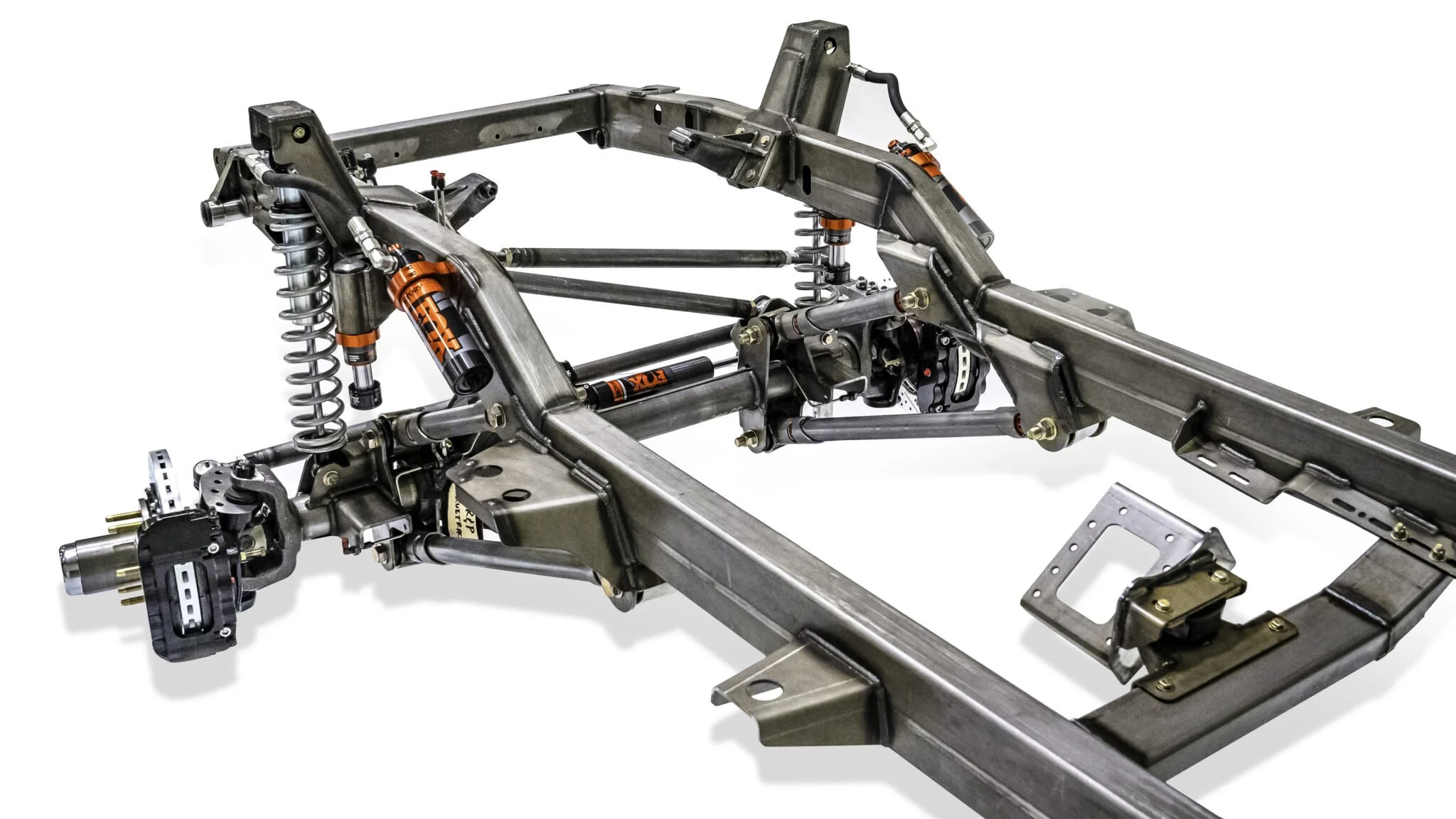 Close-up of the Vigilante chassis frame construction, demonstrating precision-engineered welds, boxed rails, and reinforced crossmember design for superior strength.