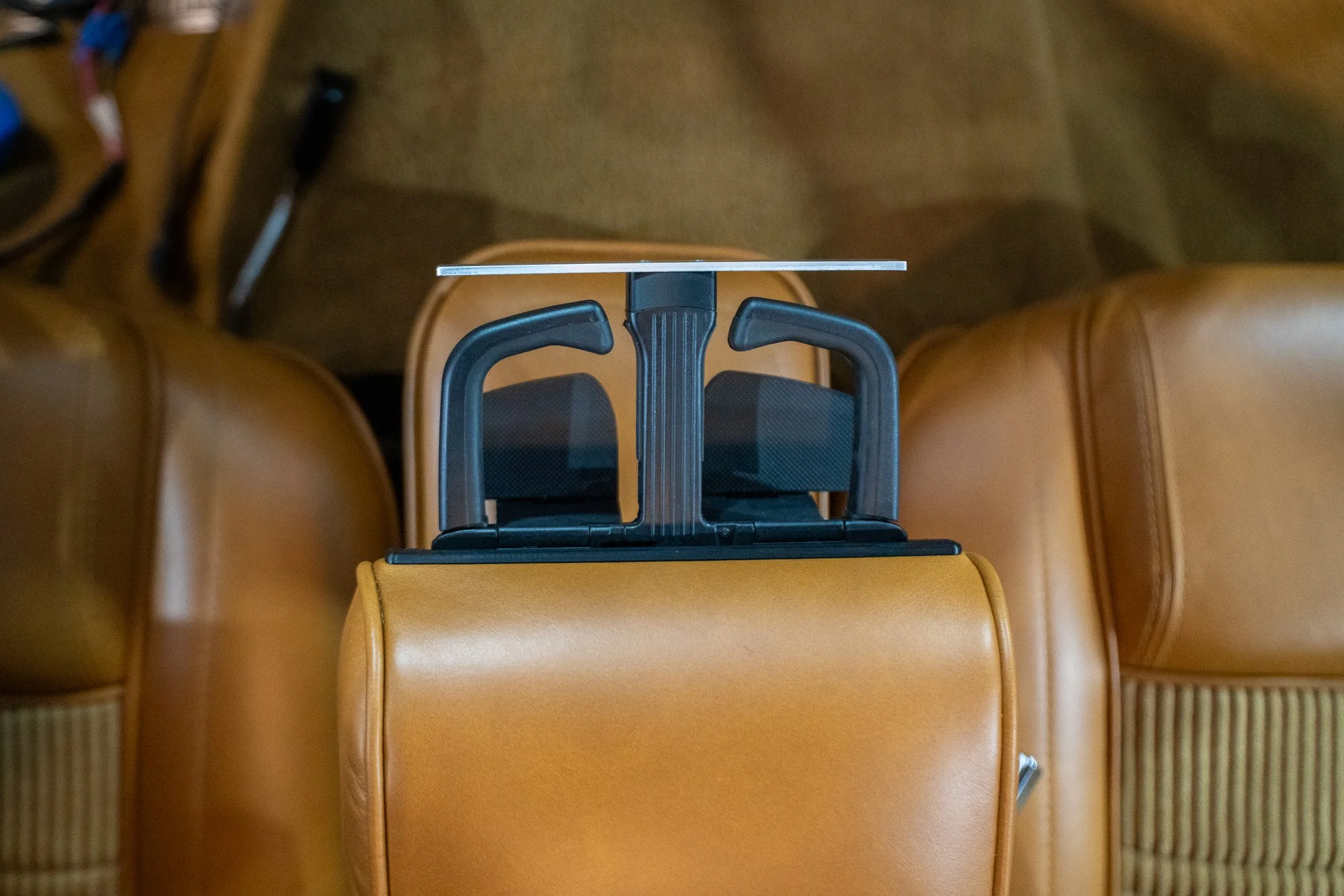 Classic Jeep Wagoneer interior with OEM style armrest upgrade