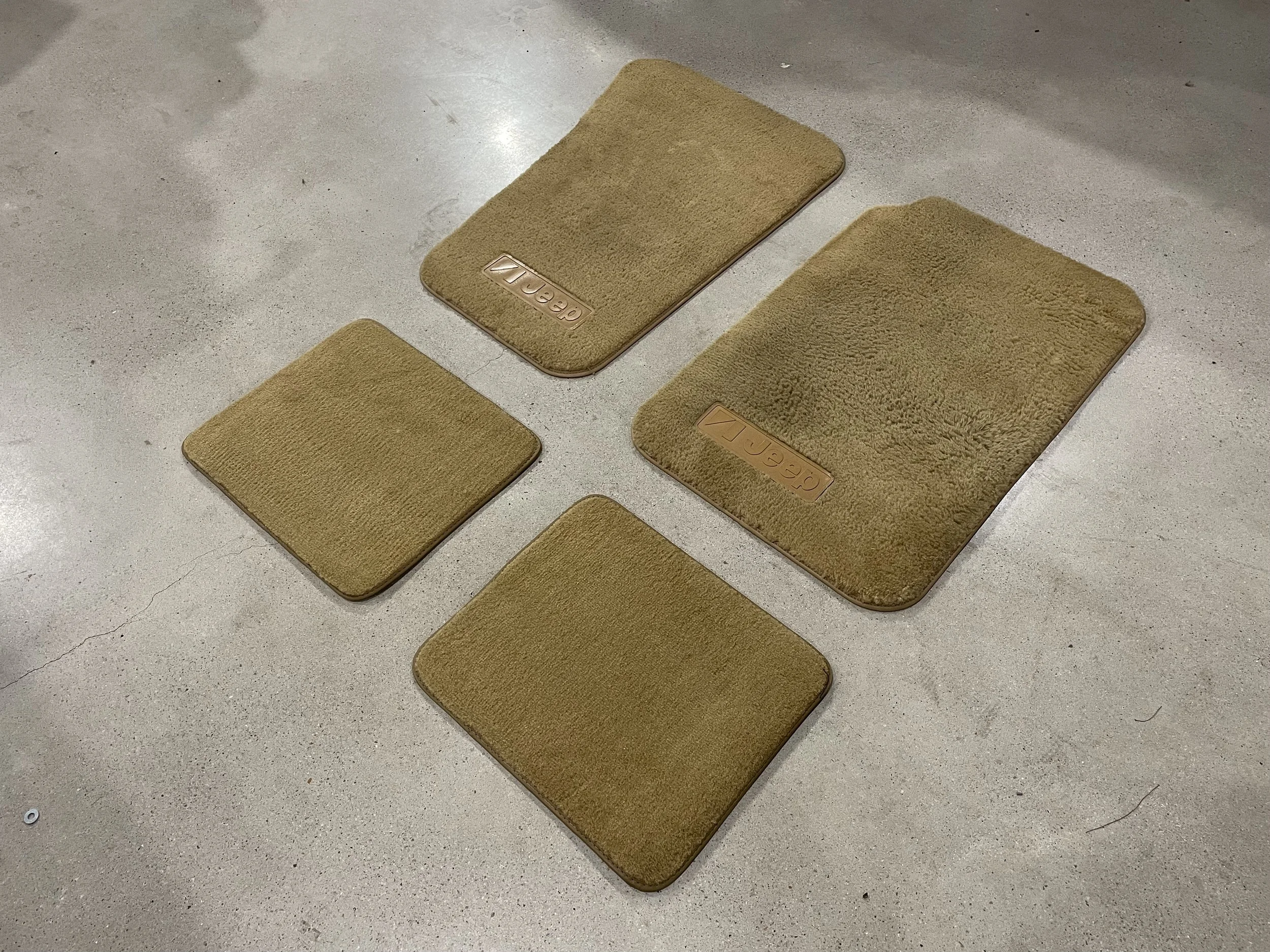 New Old Stock OEM Jeep Wagoneer Floor Mats – Tan / Sand (Set of 4, 1980s)
