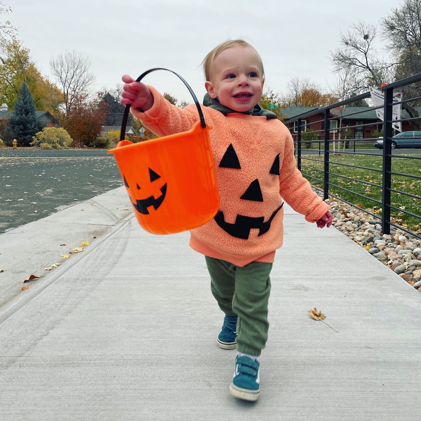 A pumpkin and his pumpkin 🎃 He doesn&rsquo;t quite get the idea of trick or treating yet, but is very amped on putting things into a basket. Next year when he understands what candy is we&rsquo;ll really be in for it.