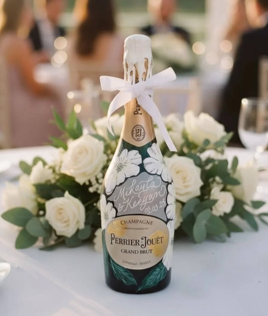 WIN 🍾 GIVEAWAY! // Imagine having a unique and beautiful hand-painted bottle that will become a treasured keepsake of your wedding day. Emma at @inkberry_calligraphy creates beautiful keepsakes, including handpainted Champagne bottles that become a 