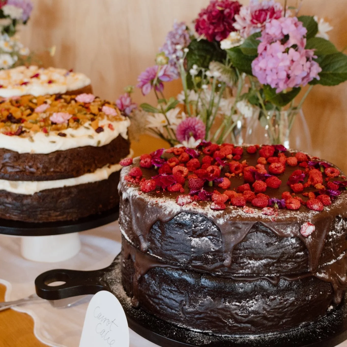 LOVE // A sweet twist on tradition 🍰 Instead of one classic wedding cake, Cath &amp; Thomas chose a collection of home-style cakes by a local caterer &mdash; personal, delicious and perfect for sharing. 🍰🍰🍰
See all their beautiful details in our 