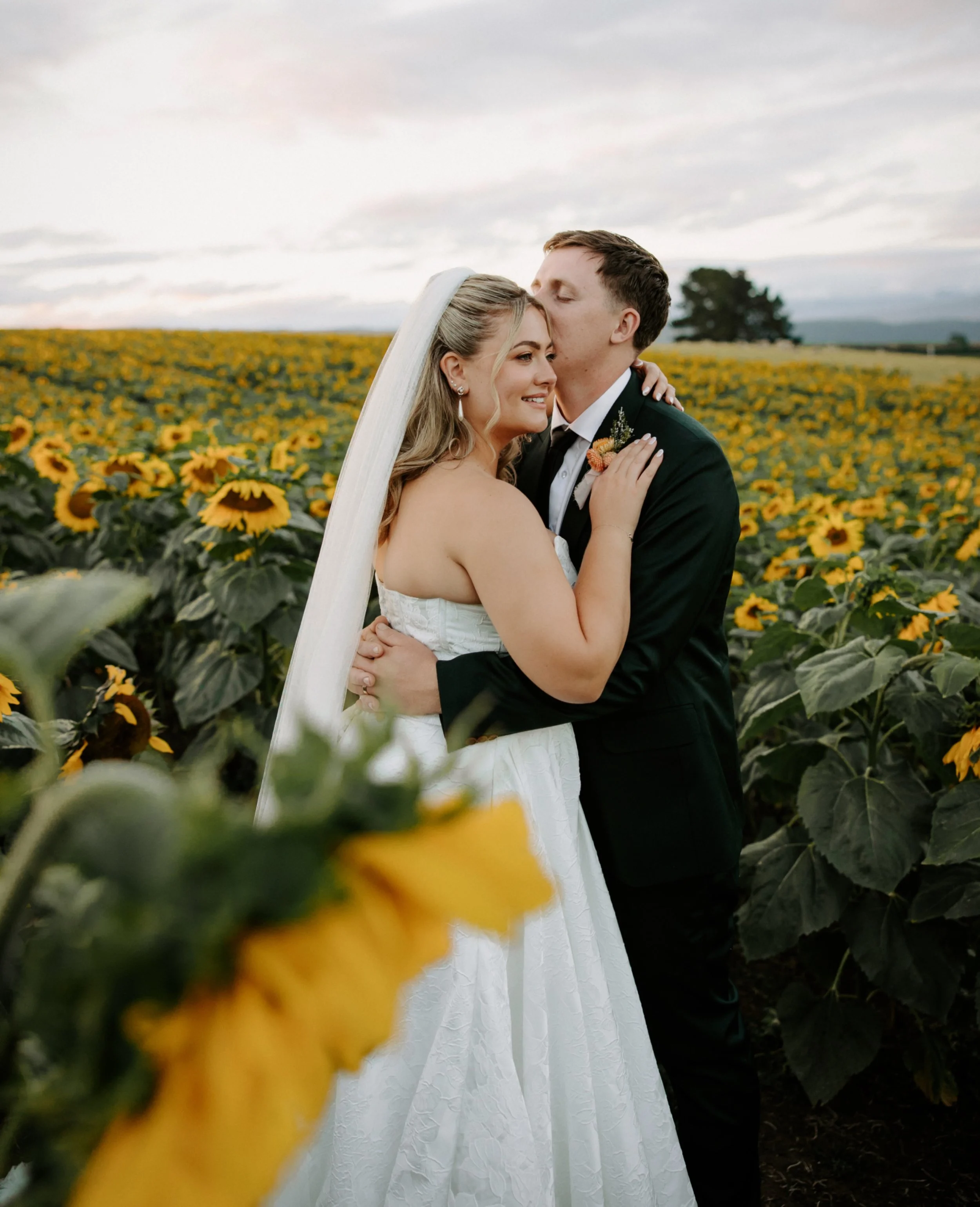 REAL LOVE 💛 // After their first dance, Kim &amp; Kris slipped away to a nearby sunflower field for sunset&mdash;and the result was pure golden-hour magic. 🌻✨ Discover their romantic wedding in our inspiration gallery&hellip; 👉 www.brideandgroom.c